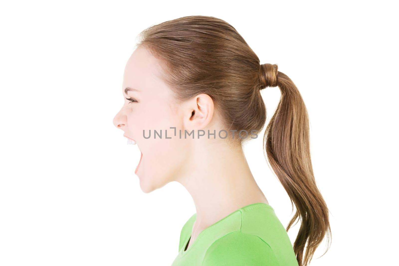 Young casual woman screaming with anger, isolated on white