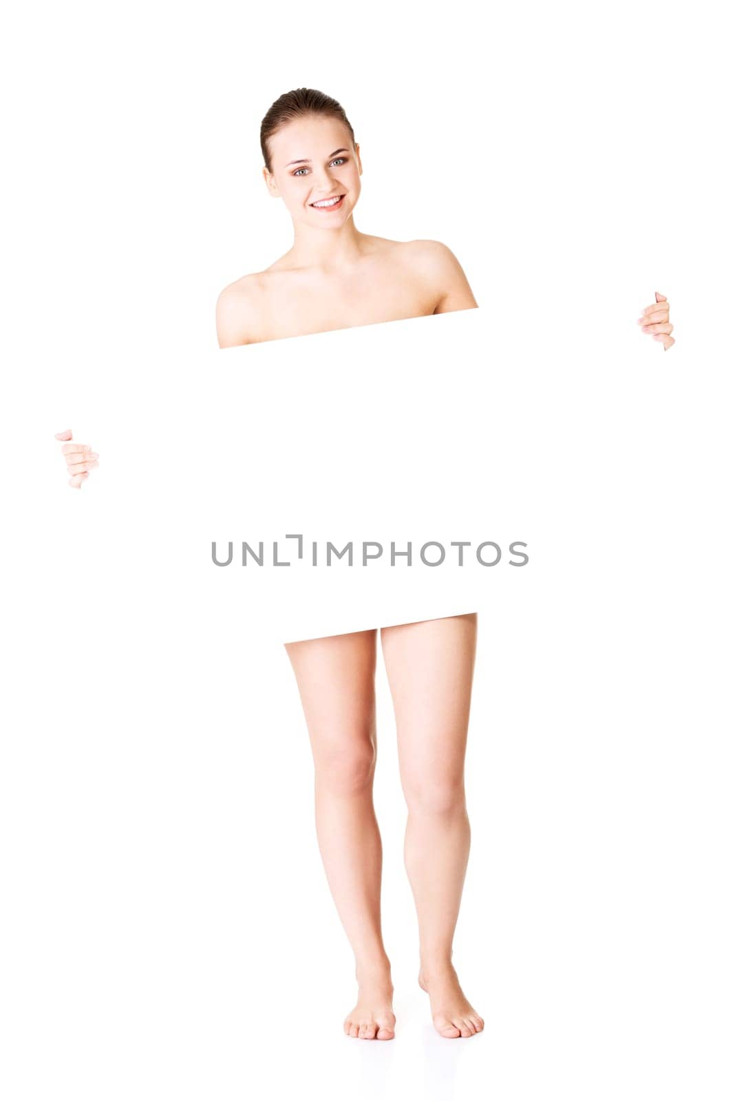 Beautiful woman with perfect skin and beautyful face holding blank board. Isolated on a White Background.