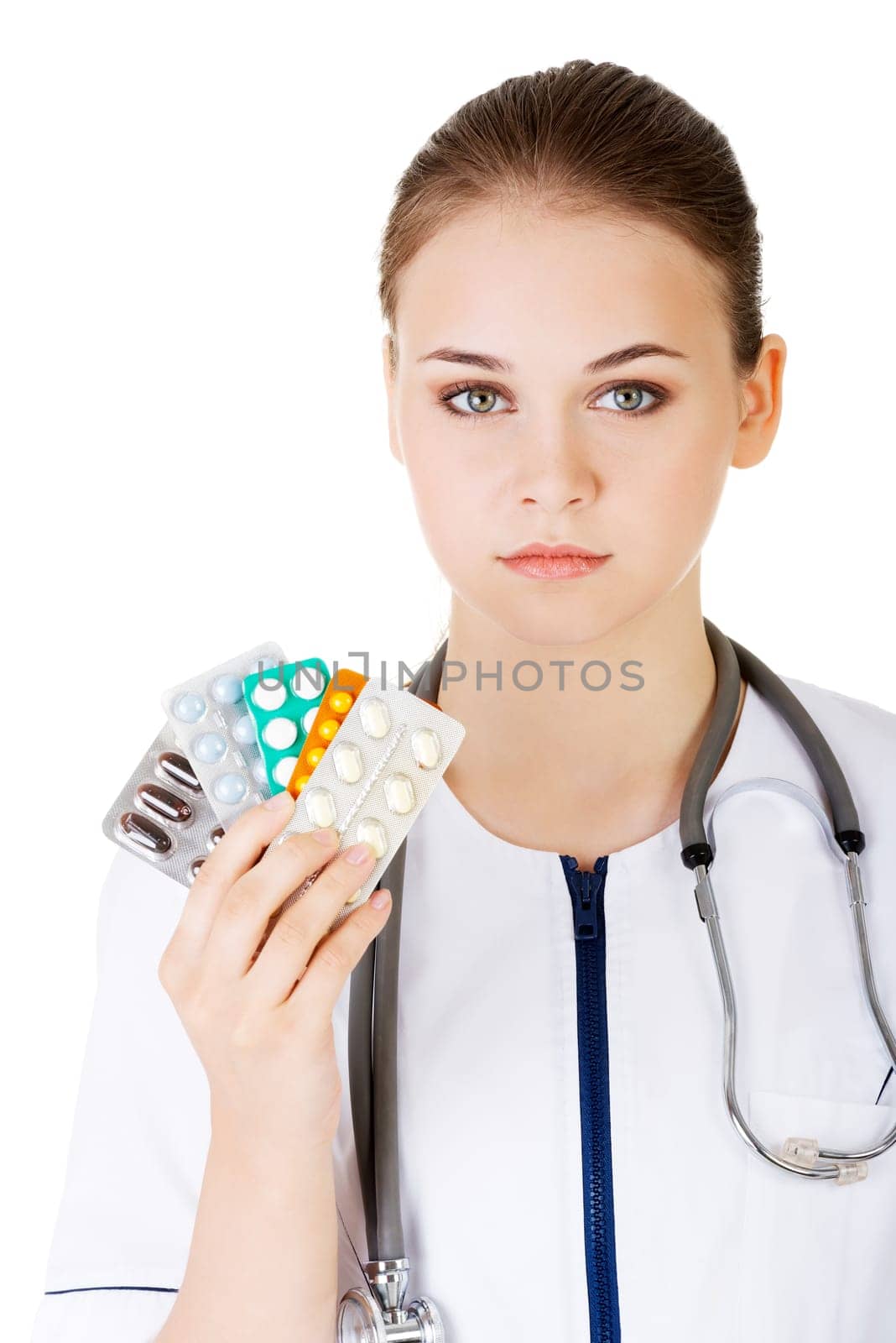 Medicine pills. Doctor or nurse showing medical pills,  isolated on white background.