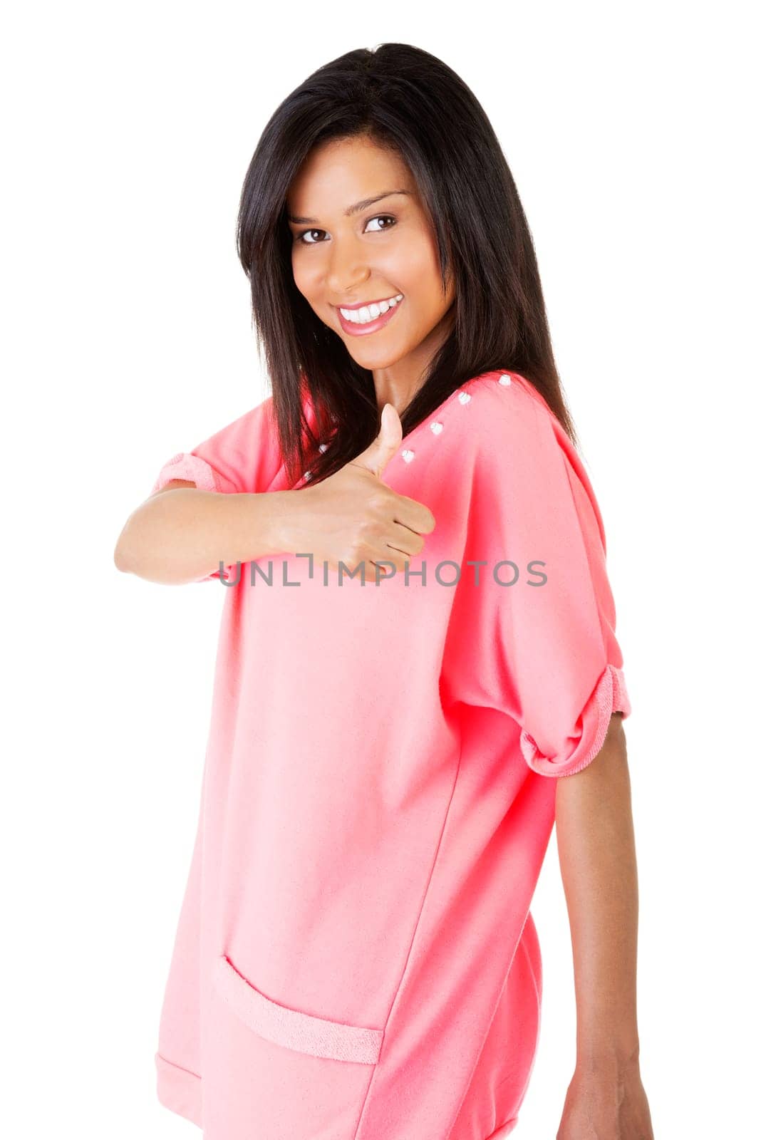 Beautiful young woman in casual clothes gesturing thumbs up.