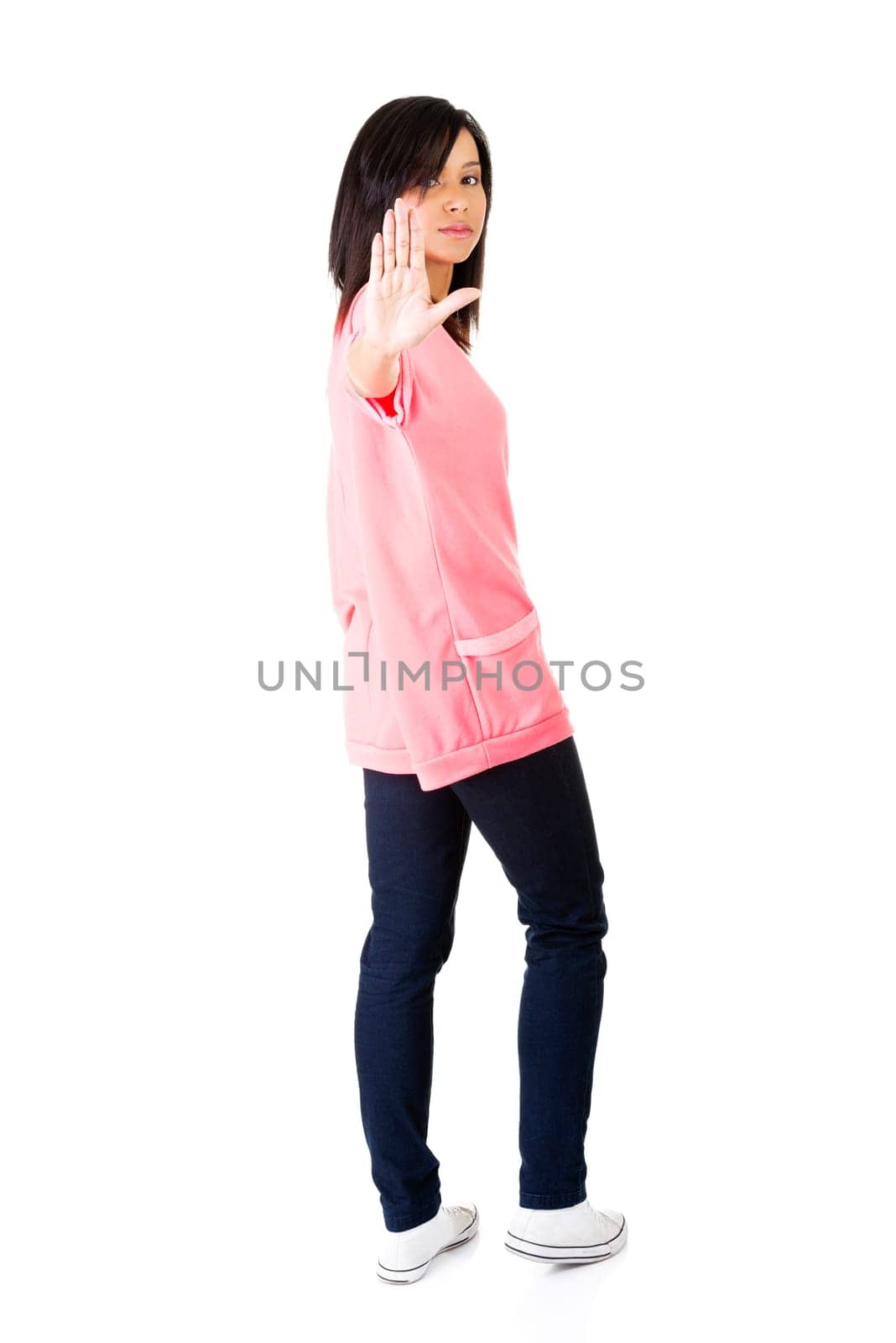Hold on, Stop gesture showed by young woman hand