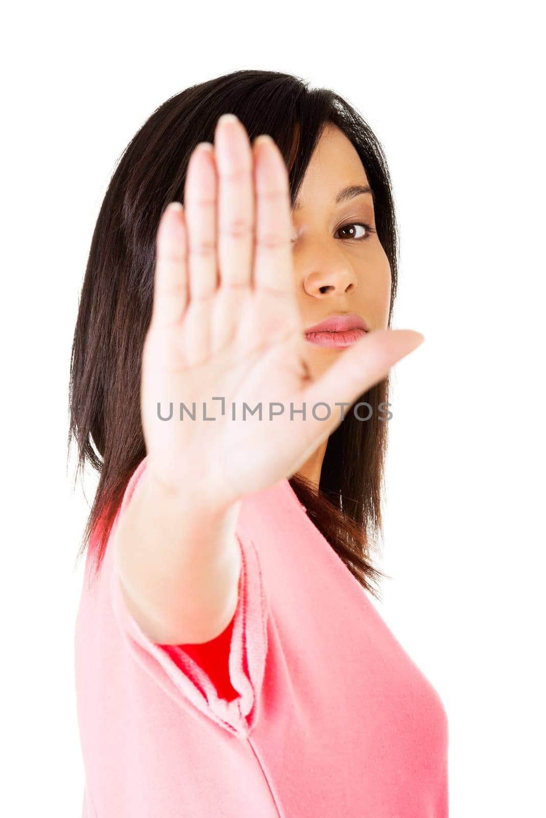 Hold on, Stop gesture showed by young woman hand