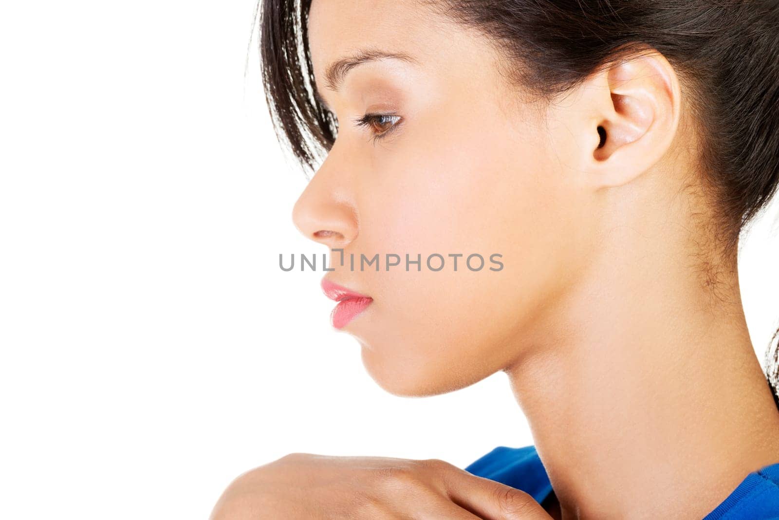 Young beautiful woman in depression. Isolated on white background.