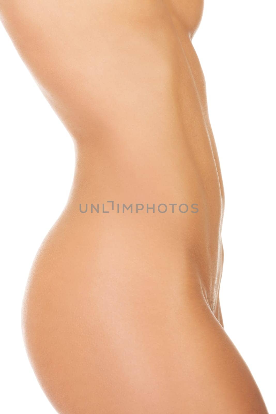 Close up of perfect nude body of young fit woman, isolated on white