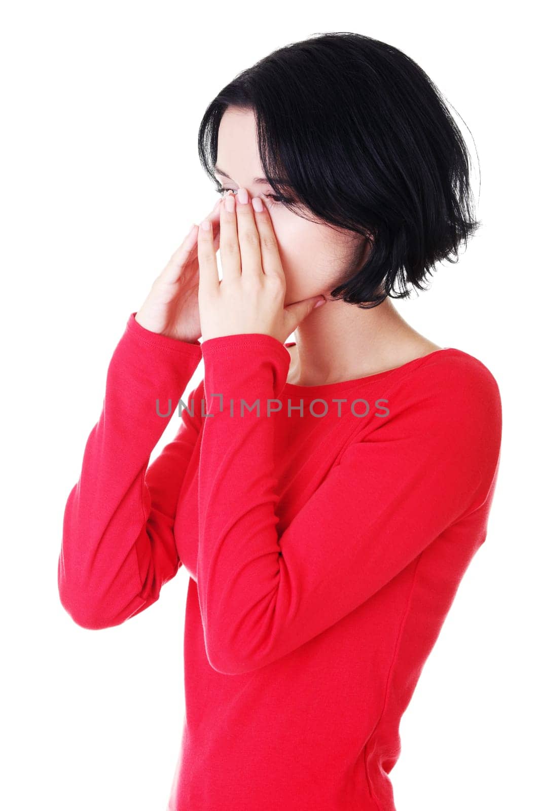Young woman with sinus pressure pain , isolated on white