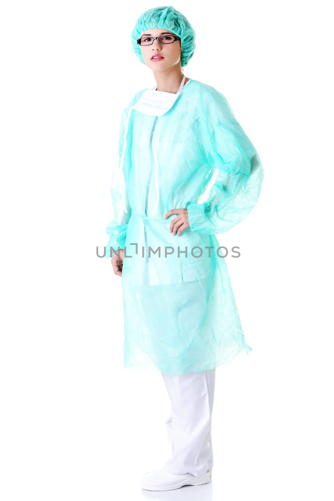 Portrait of female surgeon or nurse wearing protective uniform