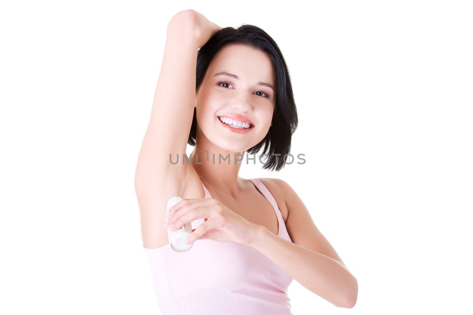 Beautiful young woman using antiperspirant , isolated