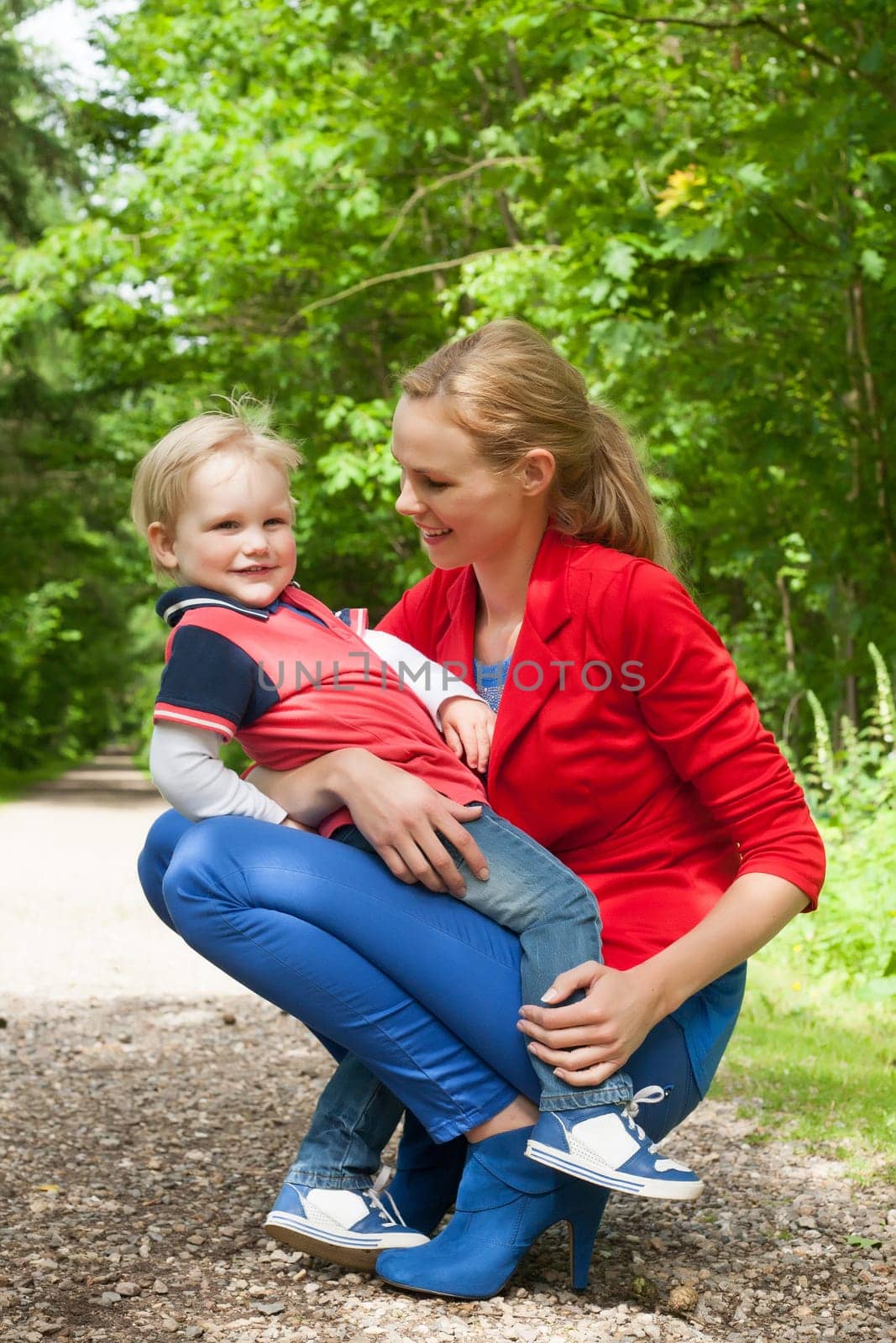 Happy mother and son having a nice day in the park