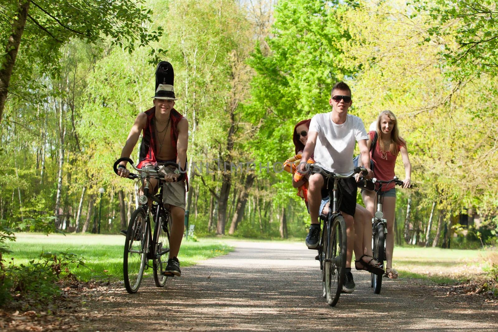Young teenagers are making a trip with the bicycles