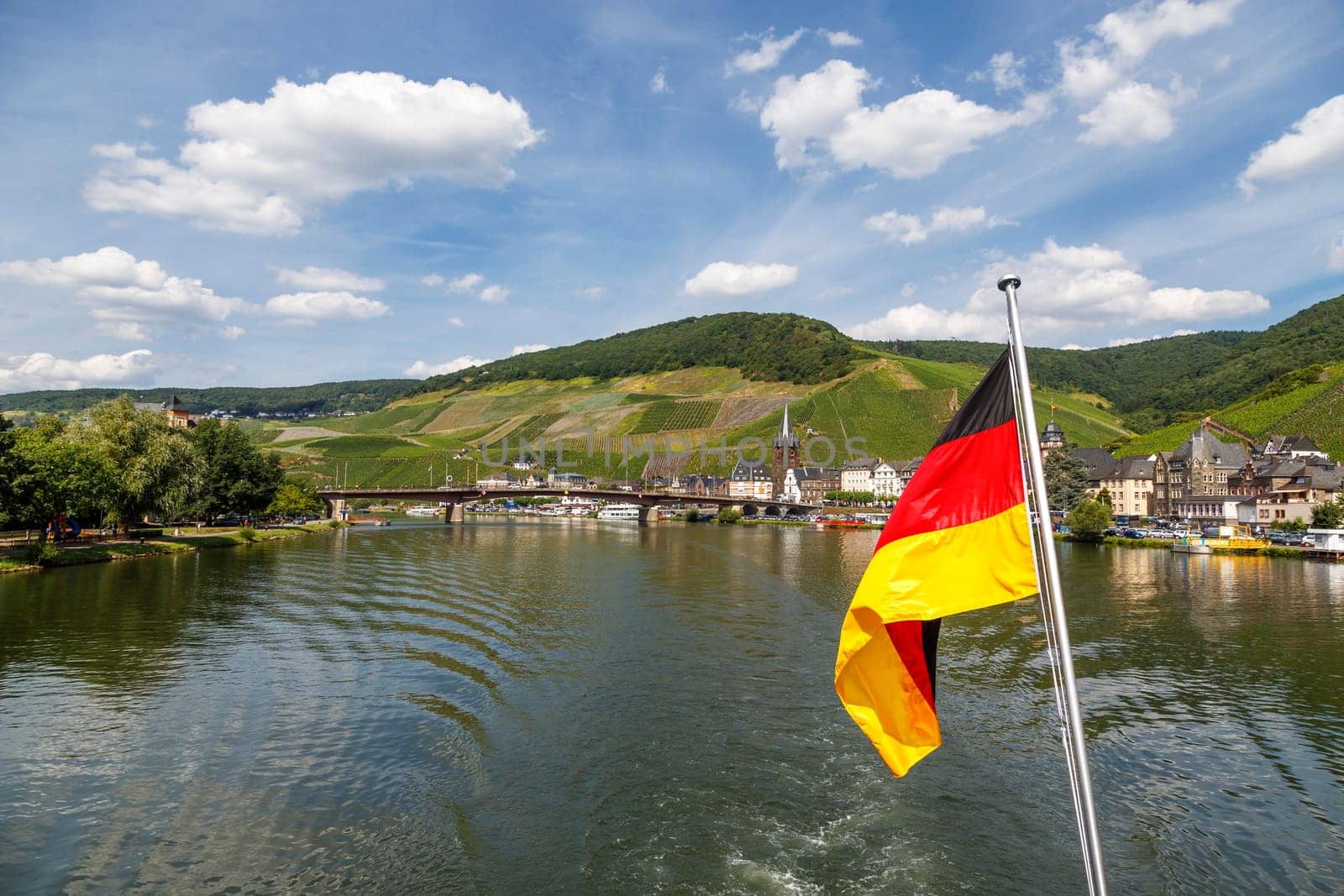 Bernkastel-Kues - town in Rhineland-Palatinat e region of Germany. Old decorative houses and vineyards next to Mosel river.