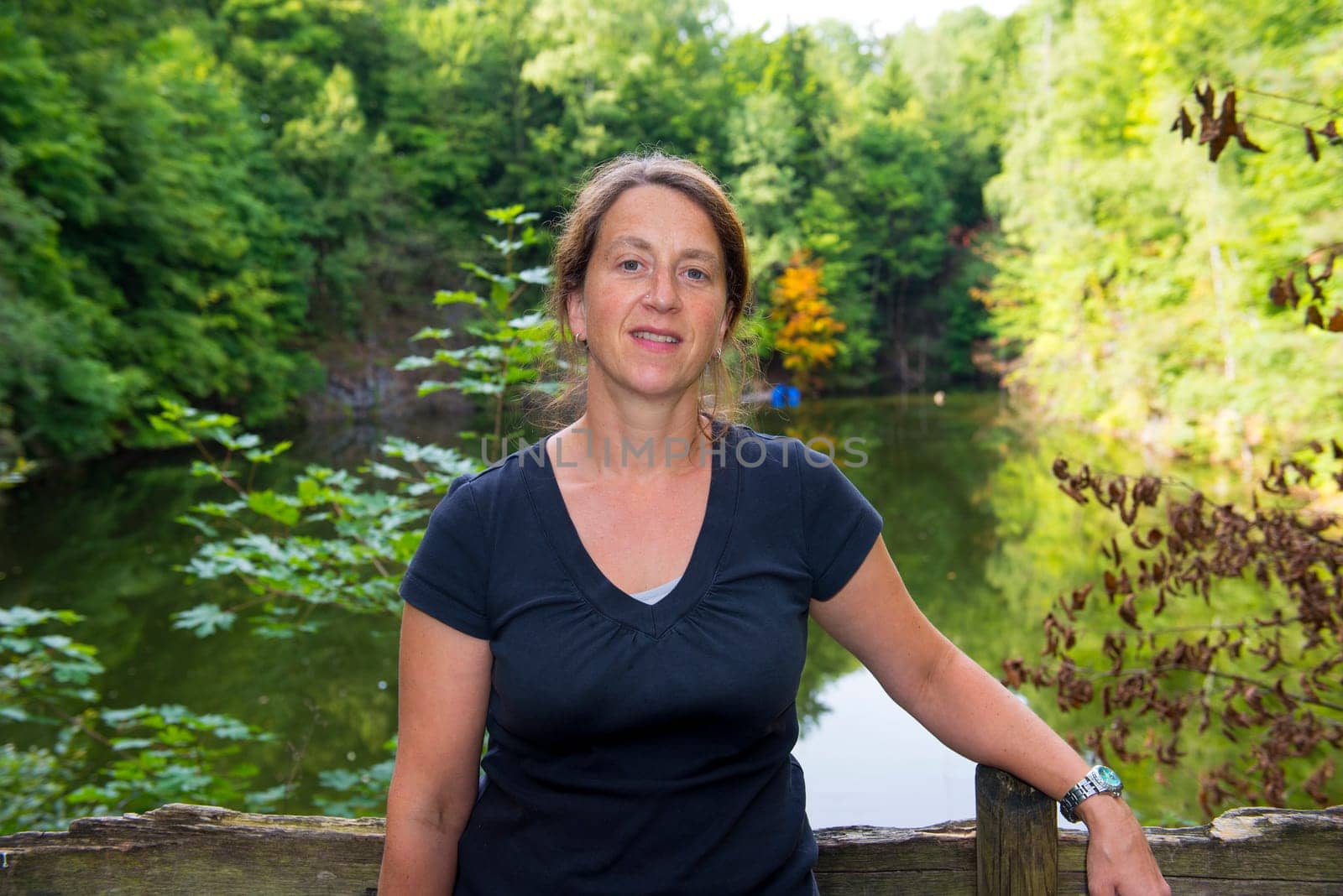 woman in front of nature- background