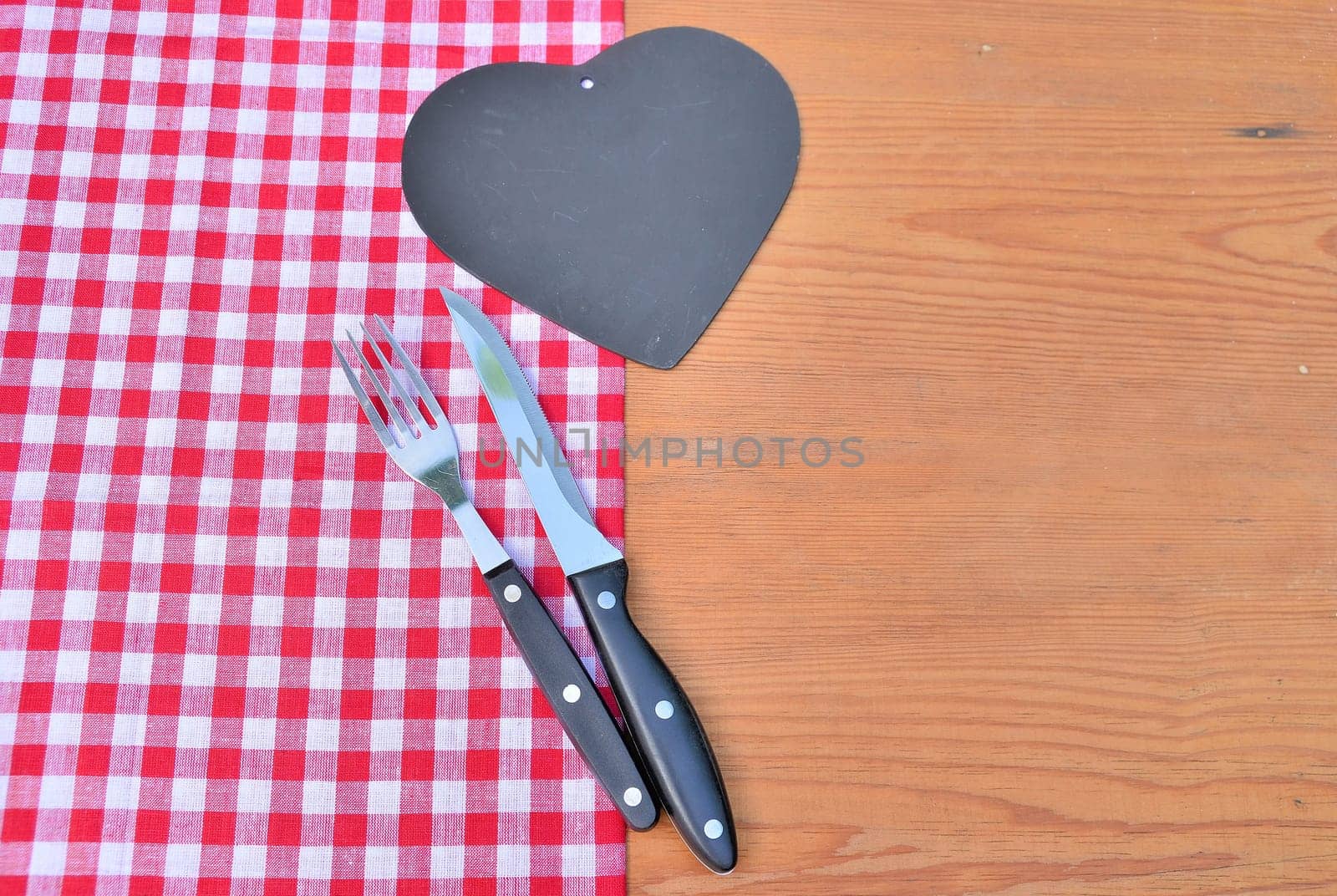 Cutlery red checkered background rustic