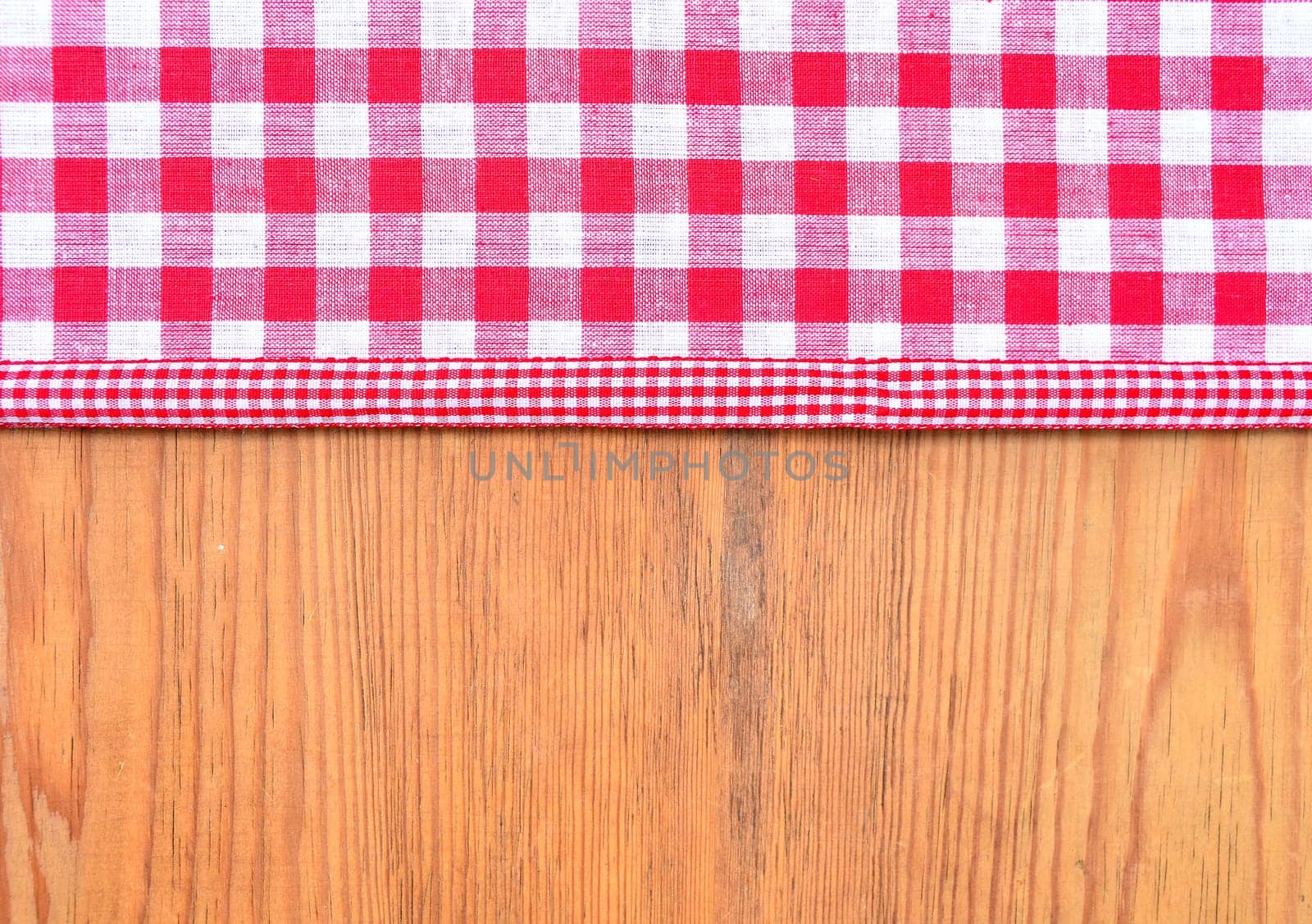 red checkered fabric rustic wooden background