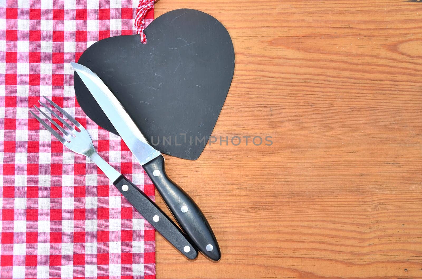 Cutlery red checkered background rustic