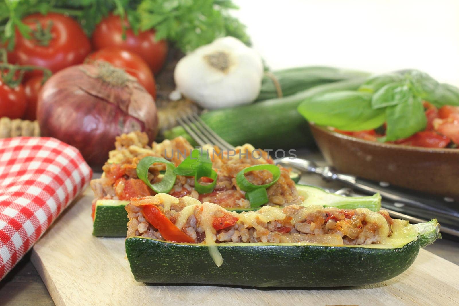 baked zucchinis stuffed with minced meat and tomatoes
