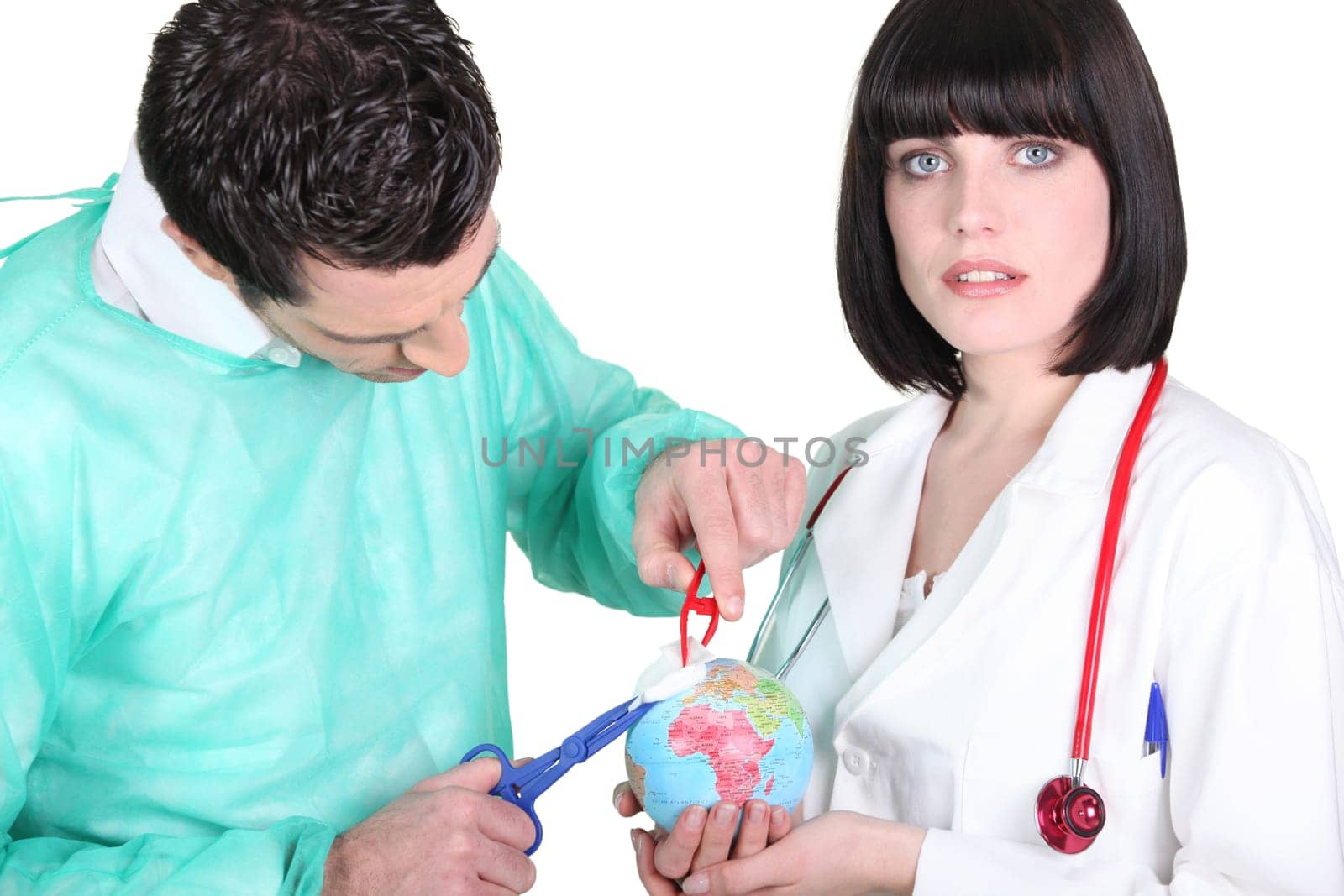 Doctors healing a globe