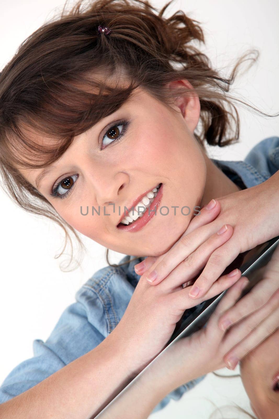 Smiling woman and her reflection