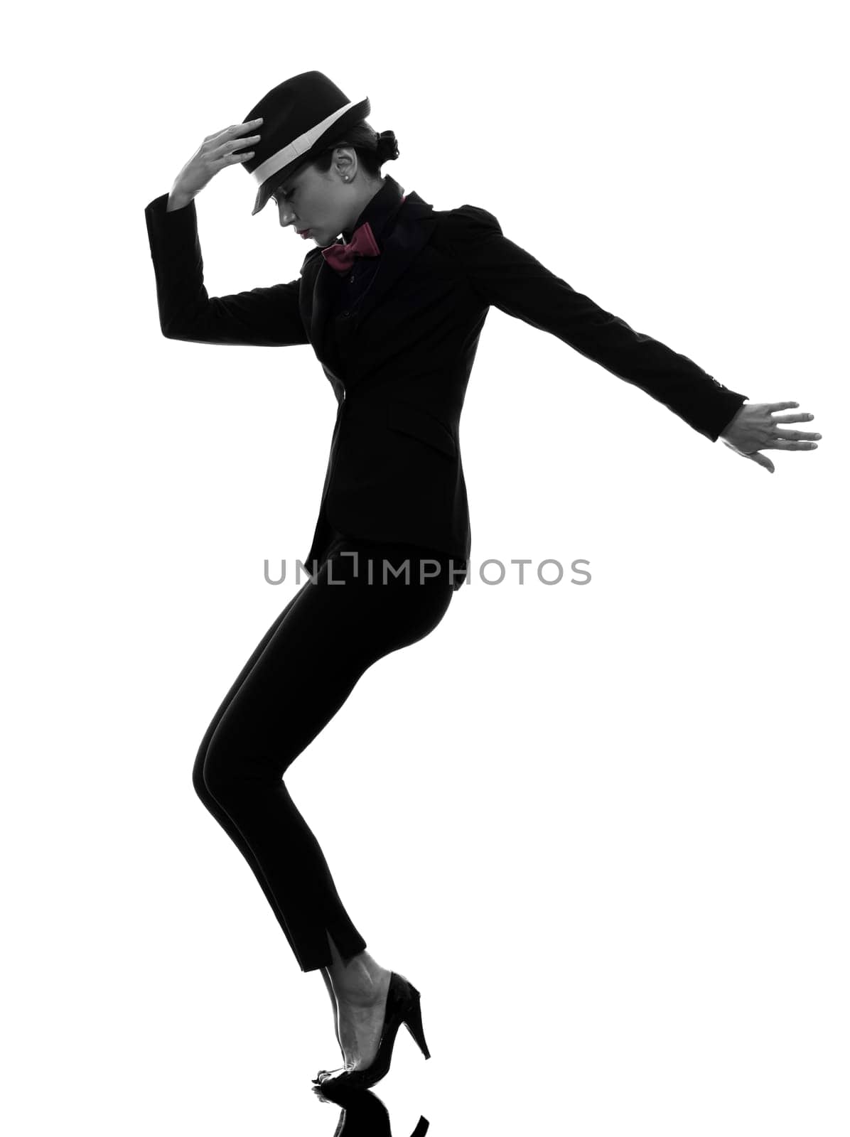 one caucasian woman dancer dancing in silhouette  on white background