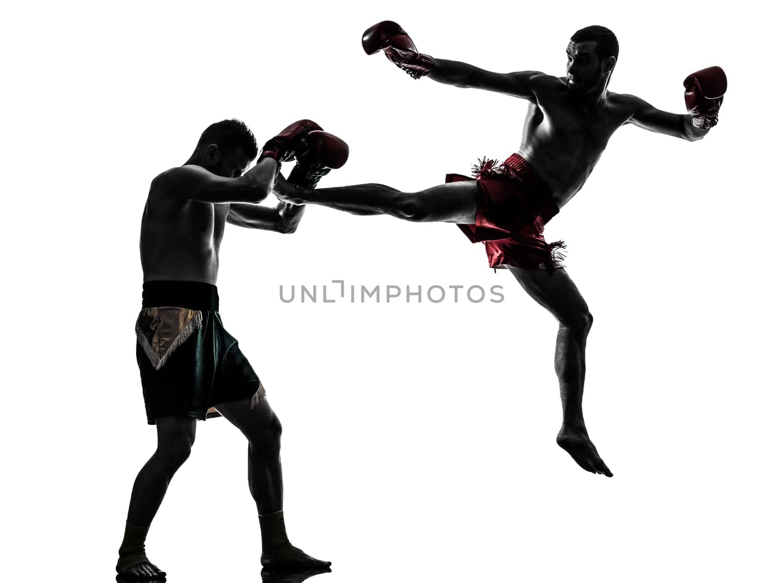 two caucasian  men exercising thai boxing in silhouette studio  on white background