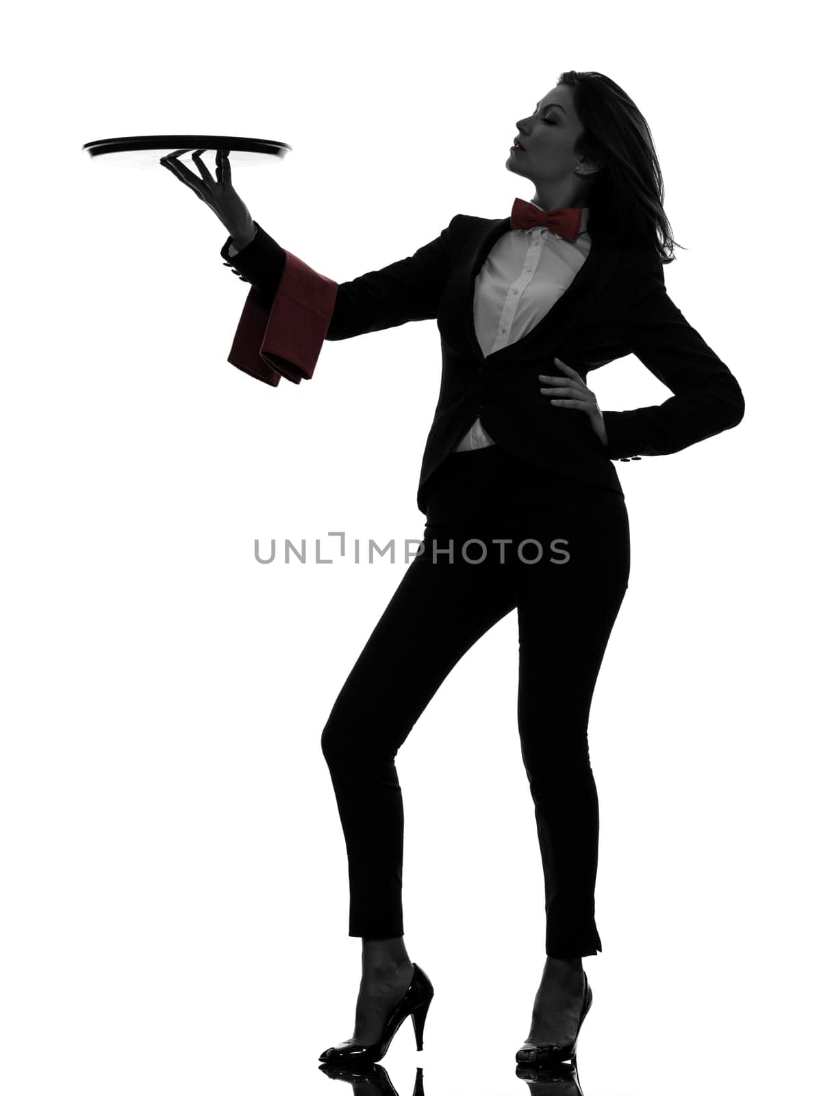 one caucasian woman waiter butler holding empty tray  in silhouette  on white background