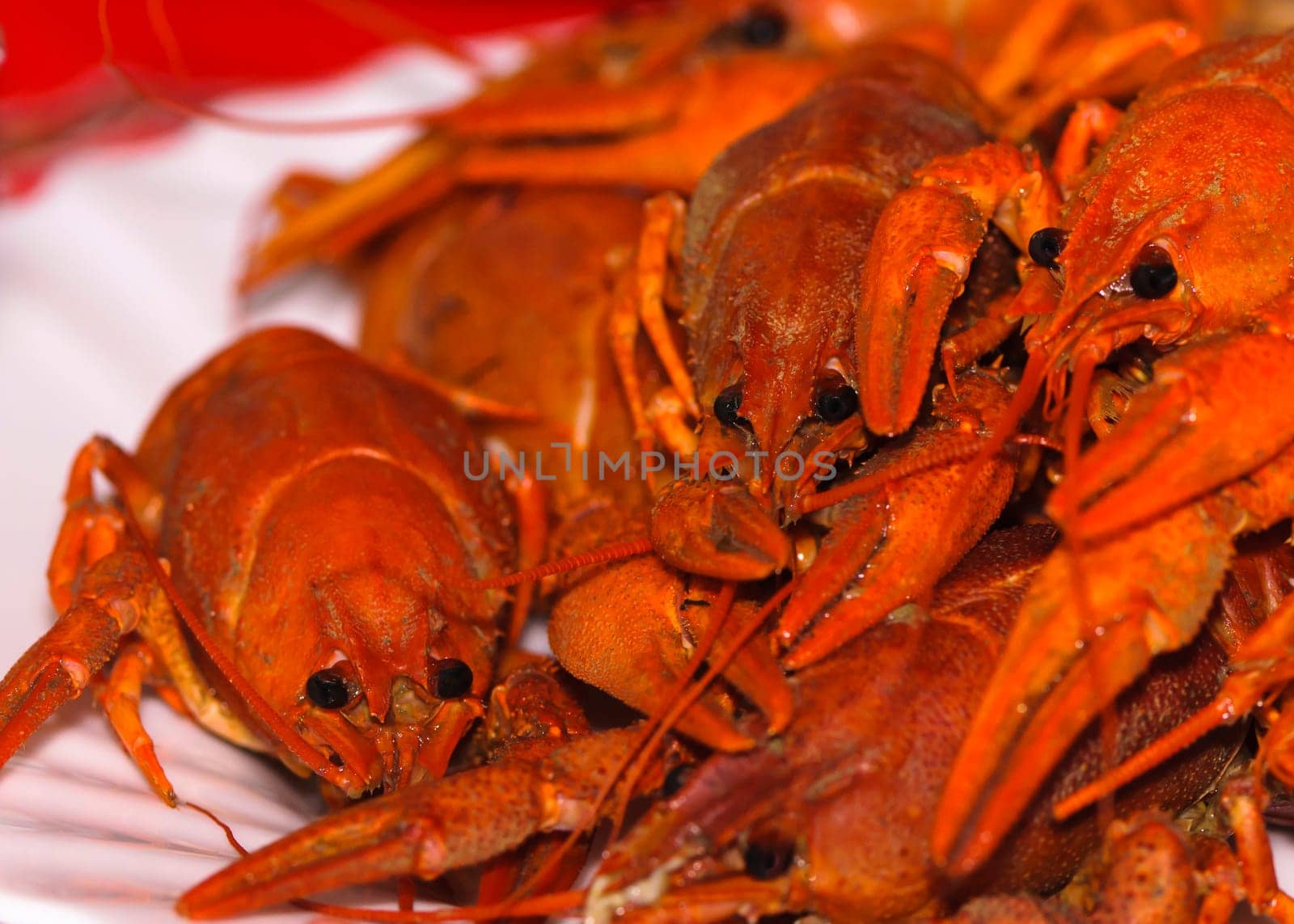 Red boiled crawfishes on a plate