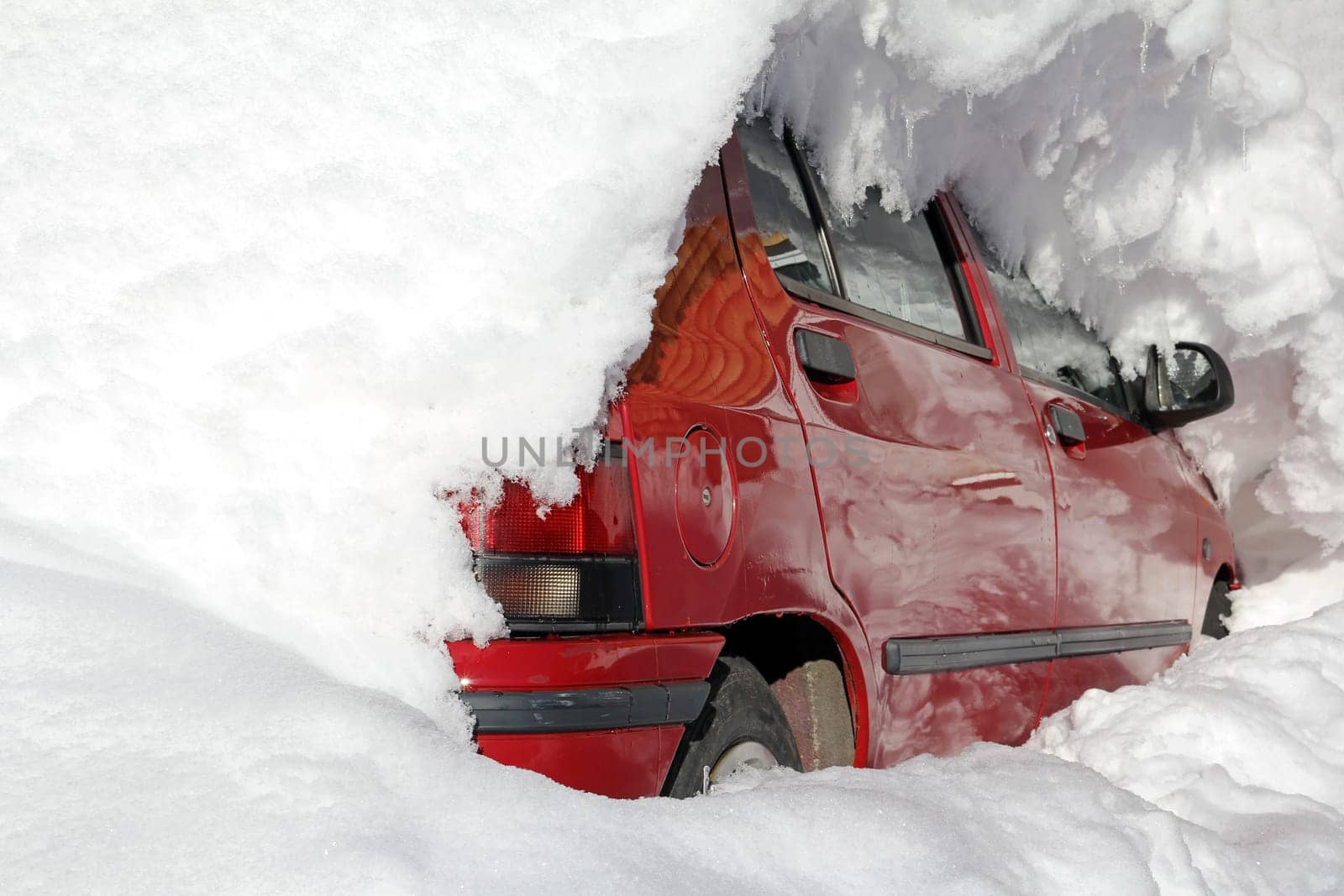 The snowed-in car