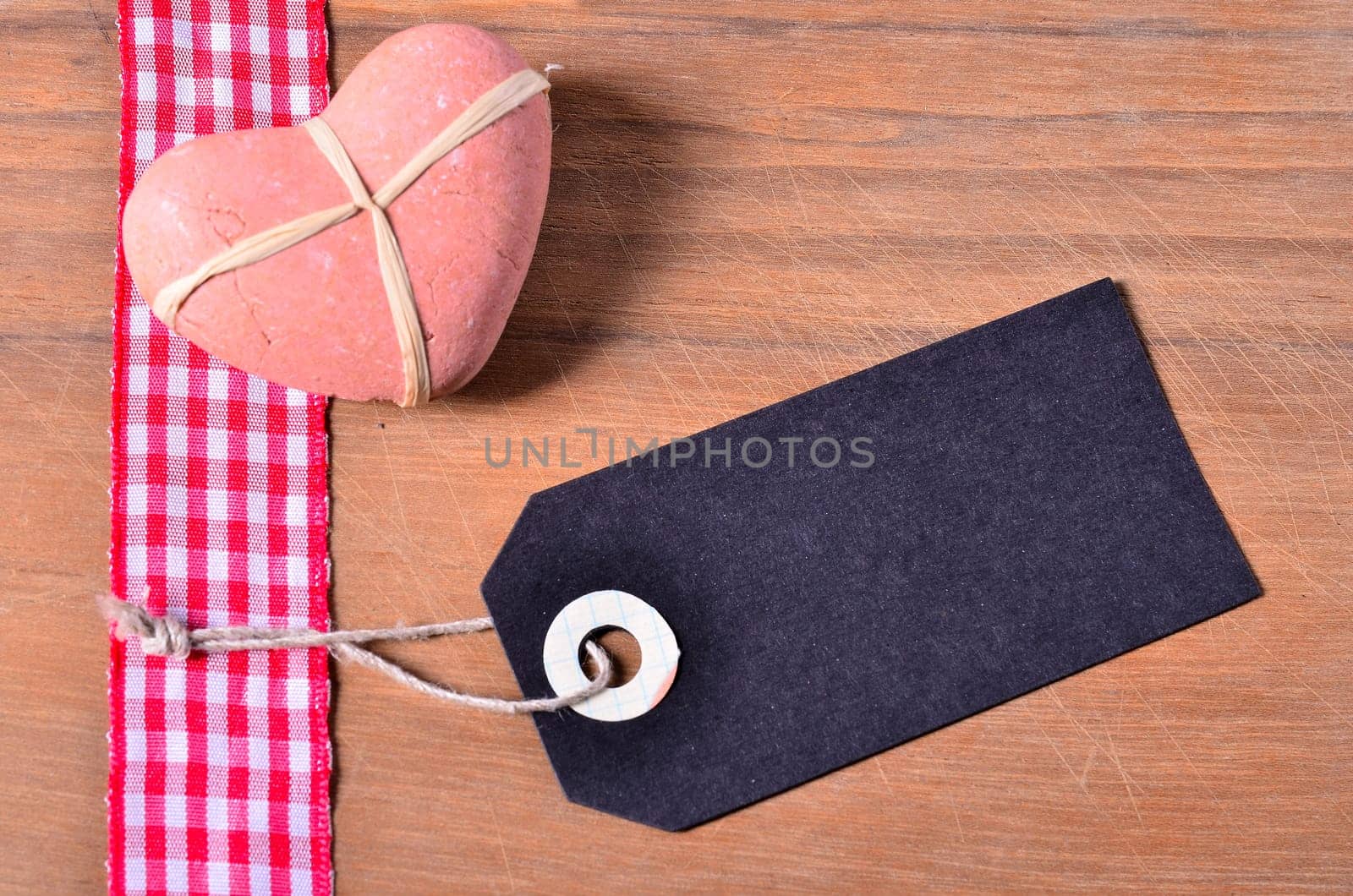 old wood background with red ribbon
