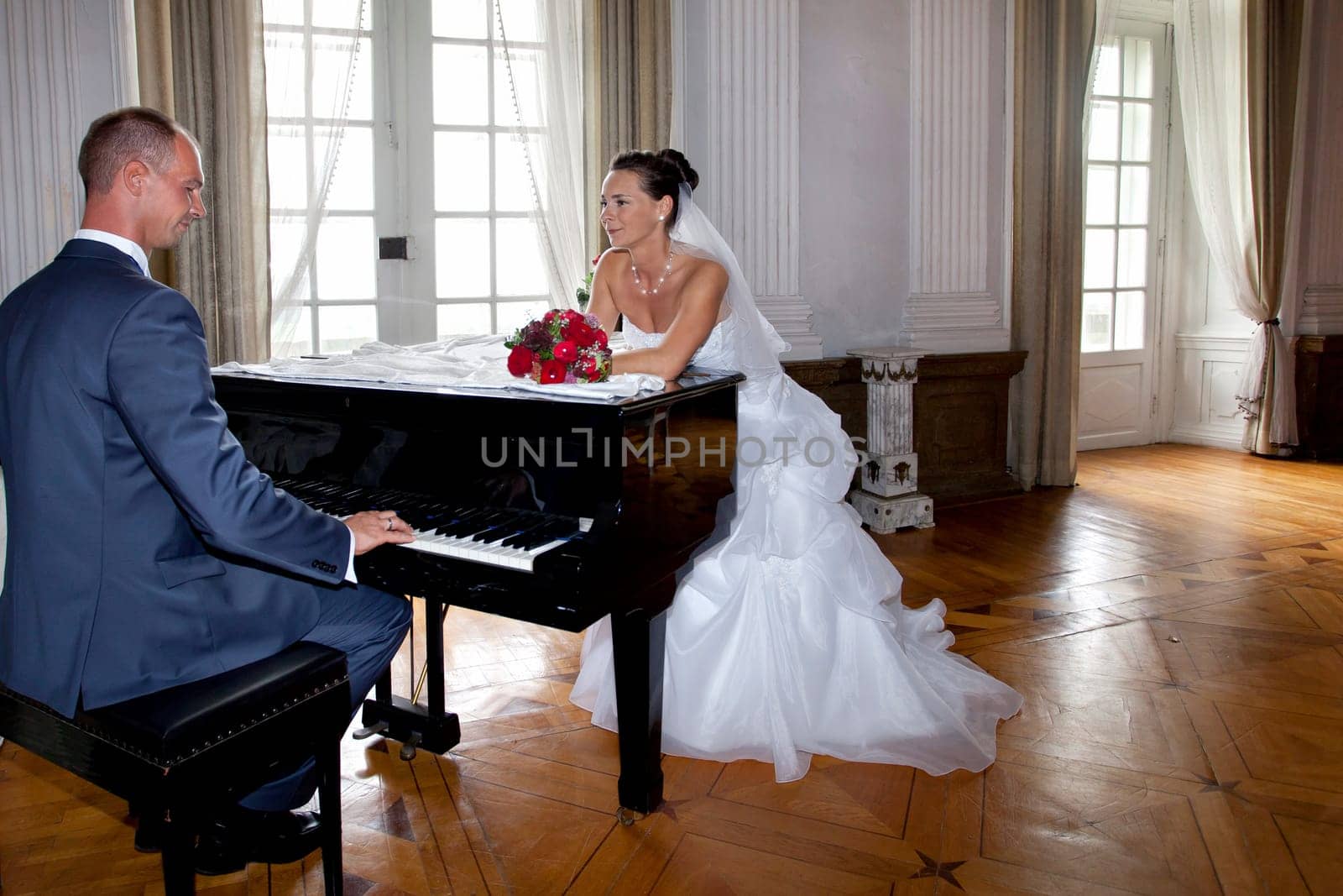 Groom at the grand piano