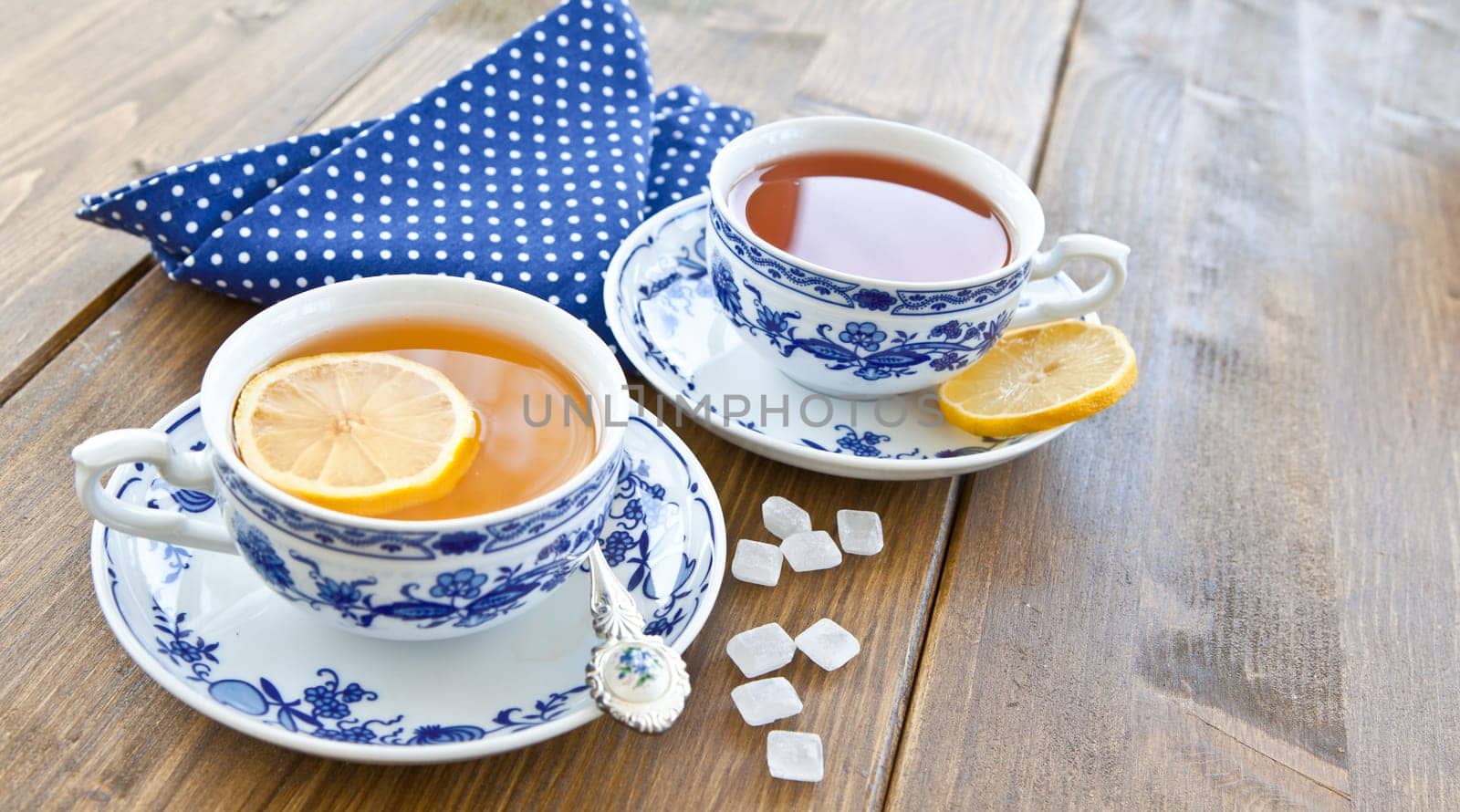 Various teas with fresh lemon and candy sugar