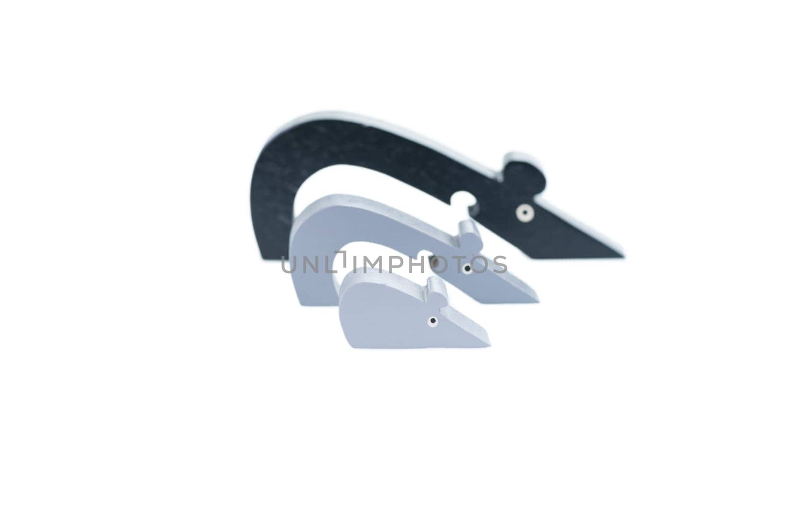 Mouse wooden puzzle over white background
