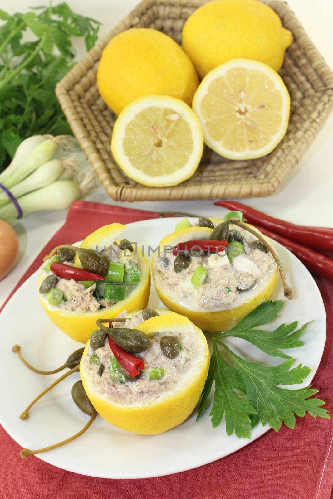 lemons stuffed with tuna cream and capers