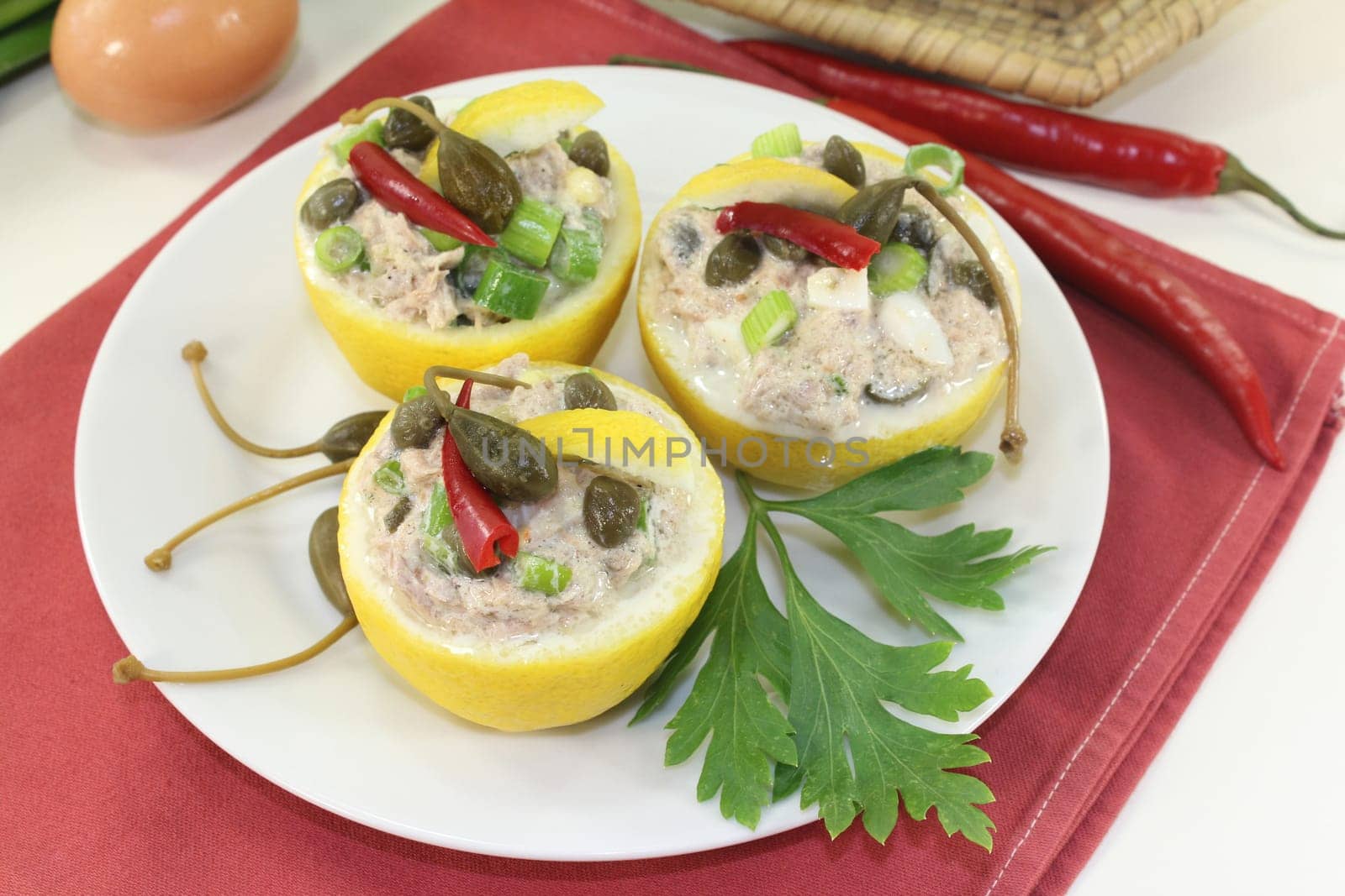 lemons stuffed with tuna cream and capers