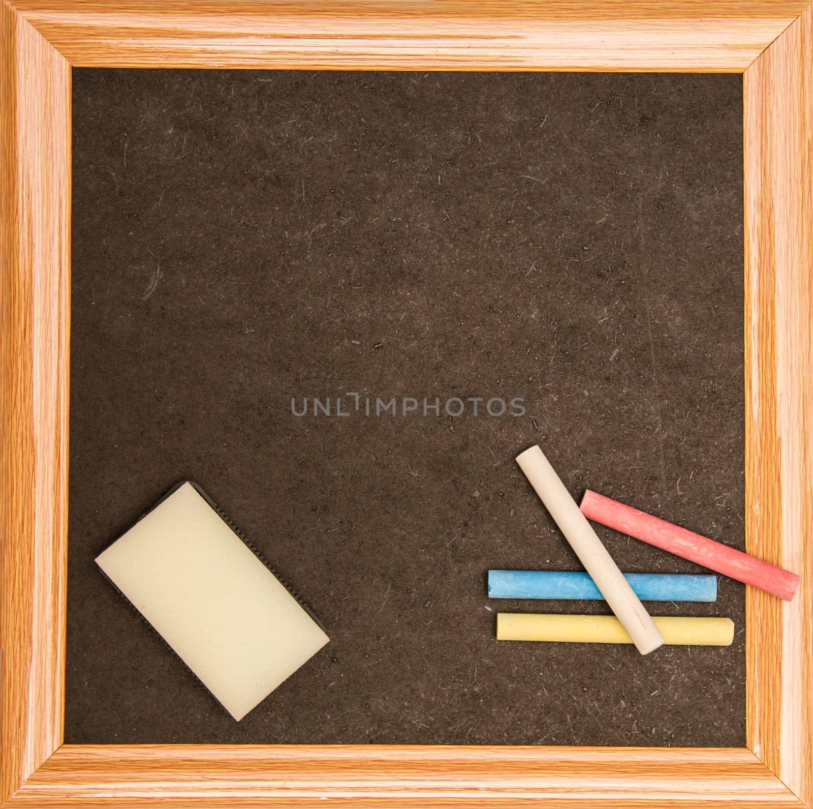 Blackboard with a wooden frame, isolated.