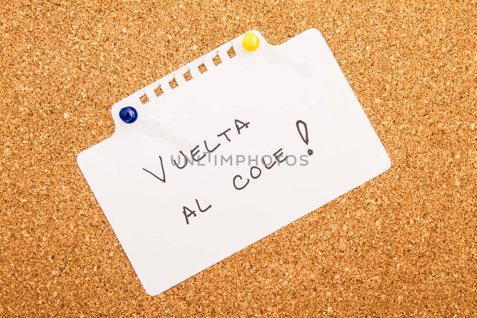 Cork board with a note..
