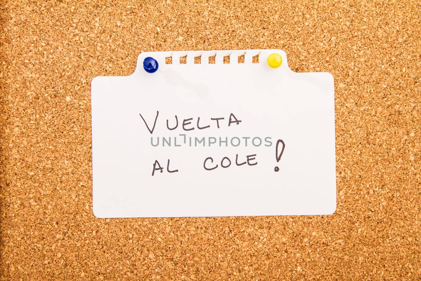 Cork board with a note..