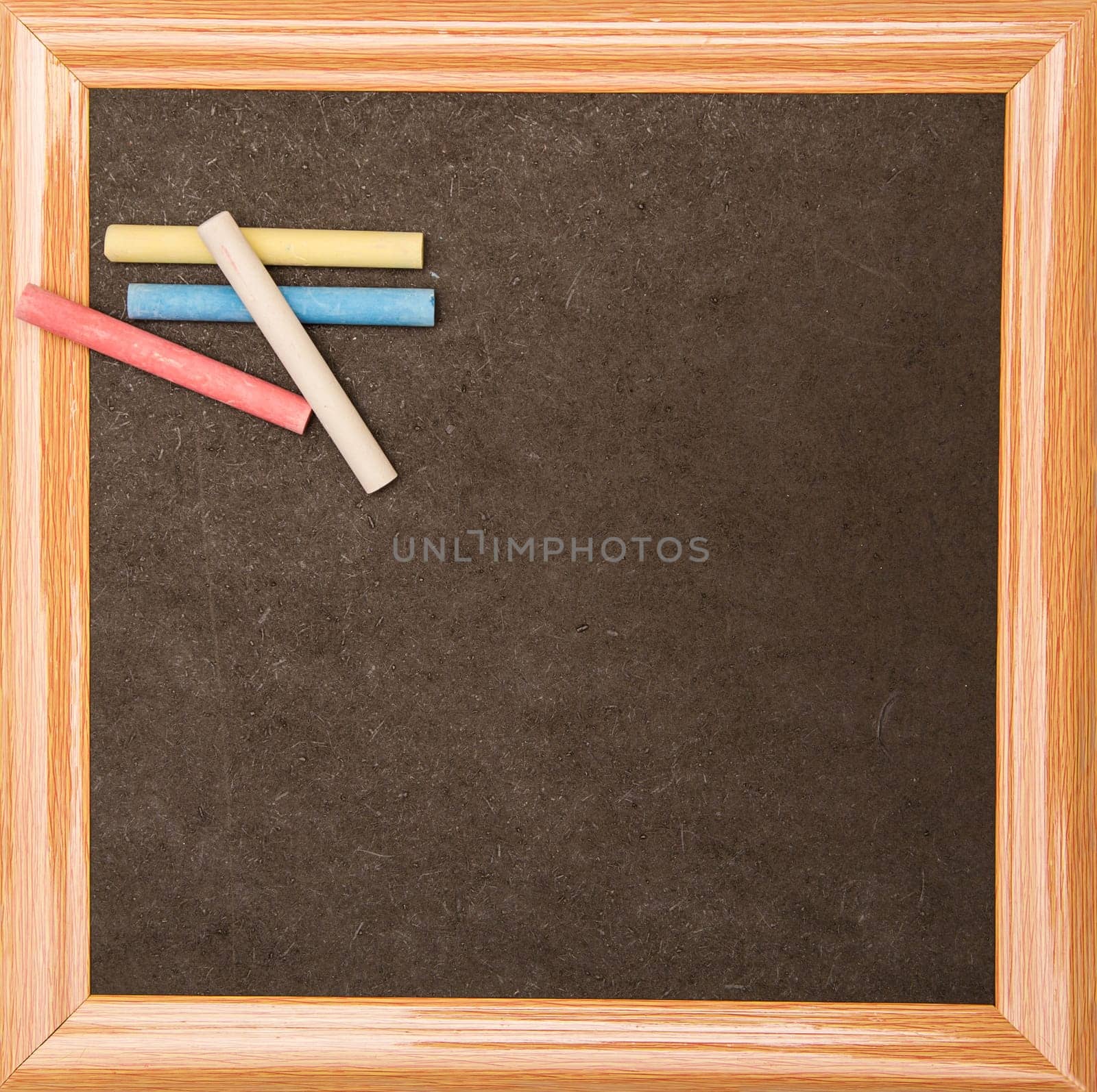 Blackboard with a wooden frame, isolated.