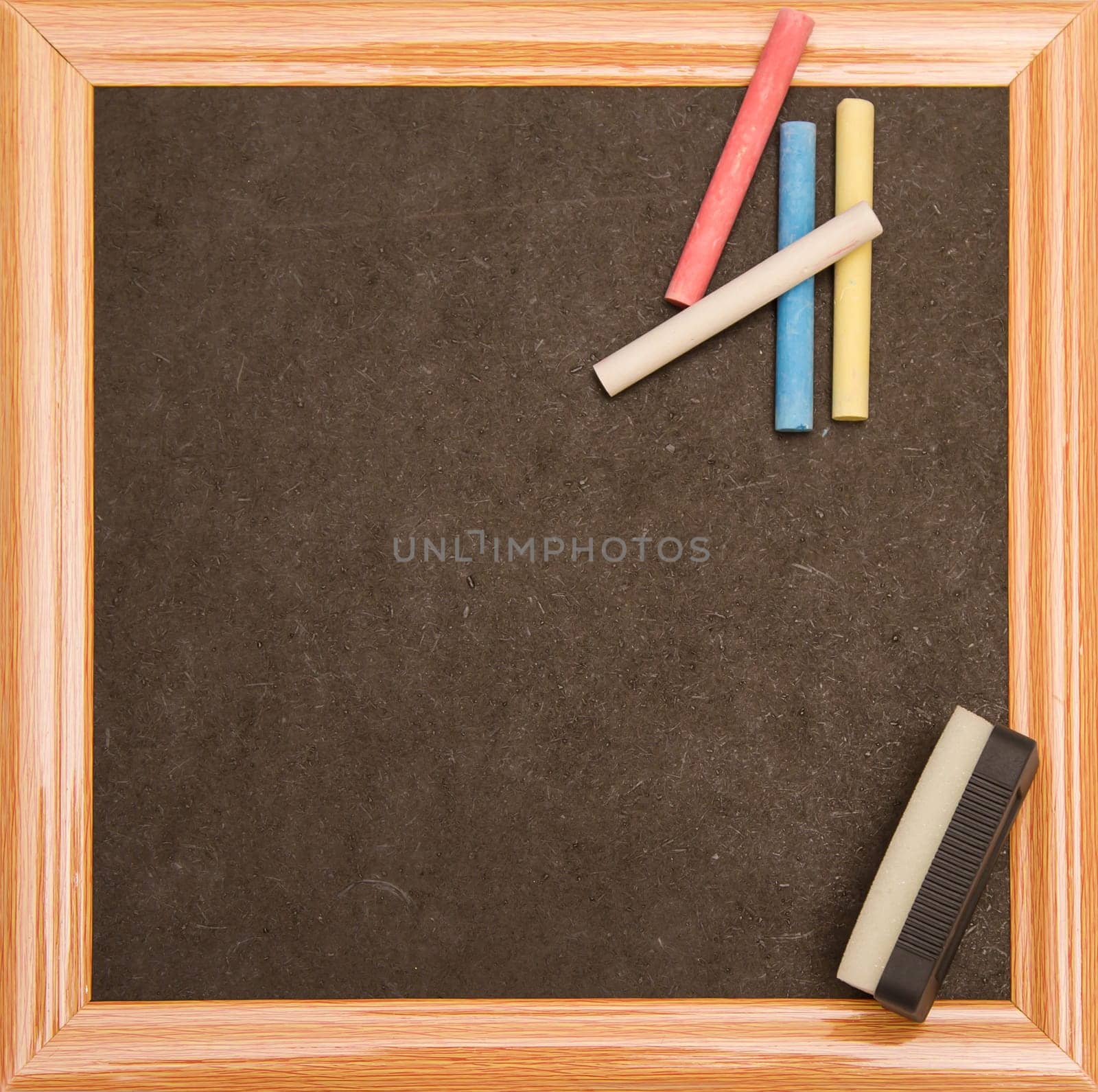 Blackboard with a wooden frame, isolated.