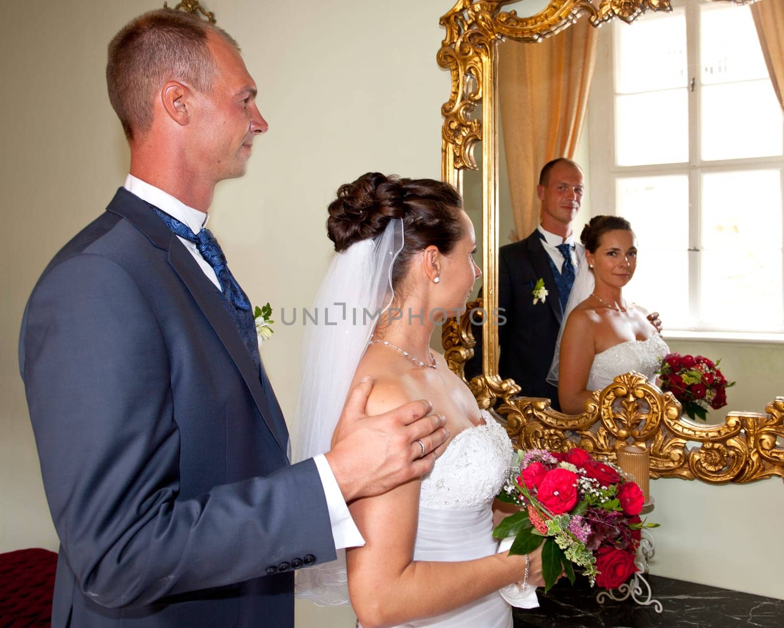 Wedding couple in the mirror