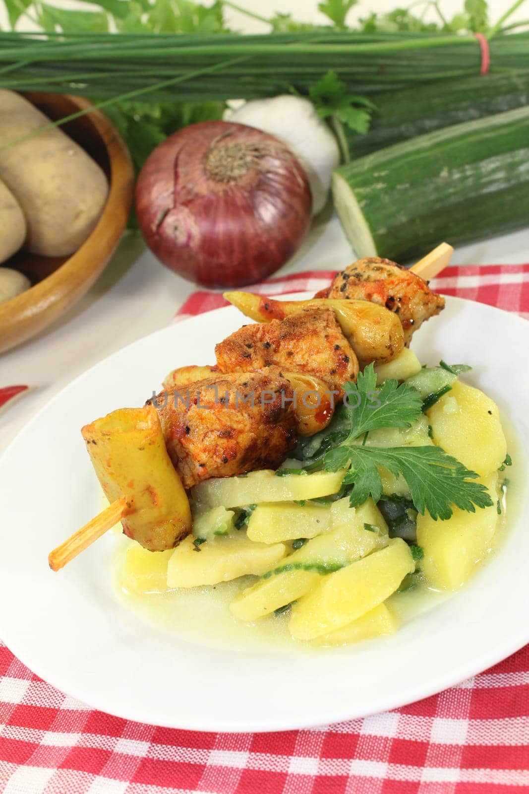 Potato-cucumber salad with a fiery skewer