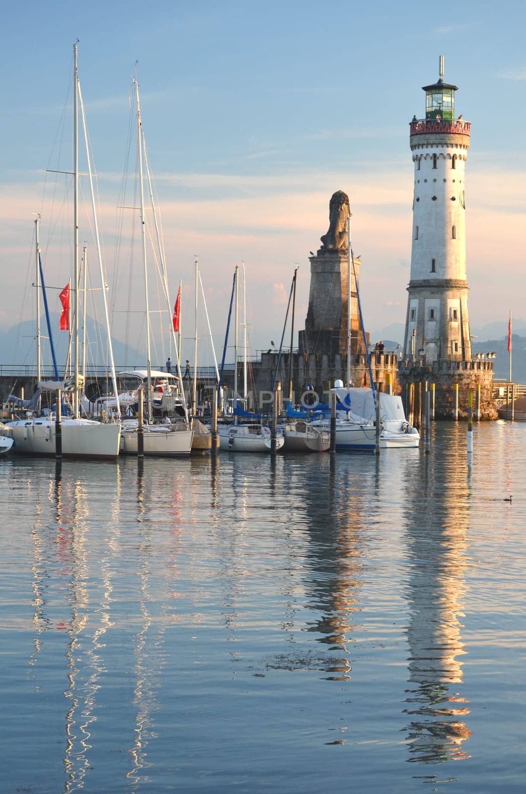 Picturesque view on the entrance of the harbor in Lindau island on Lake Bodensee, Germany