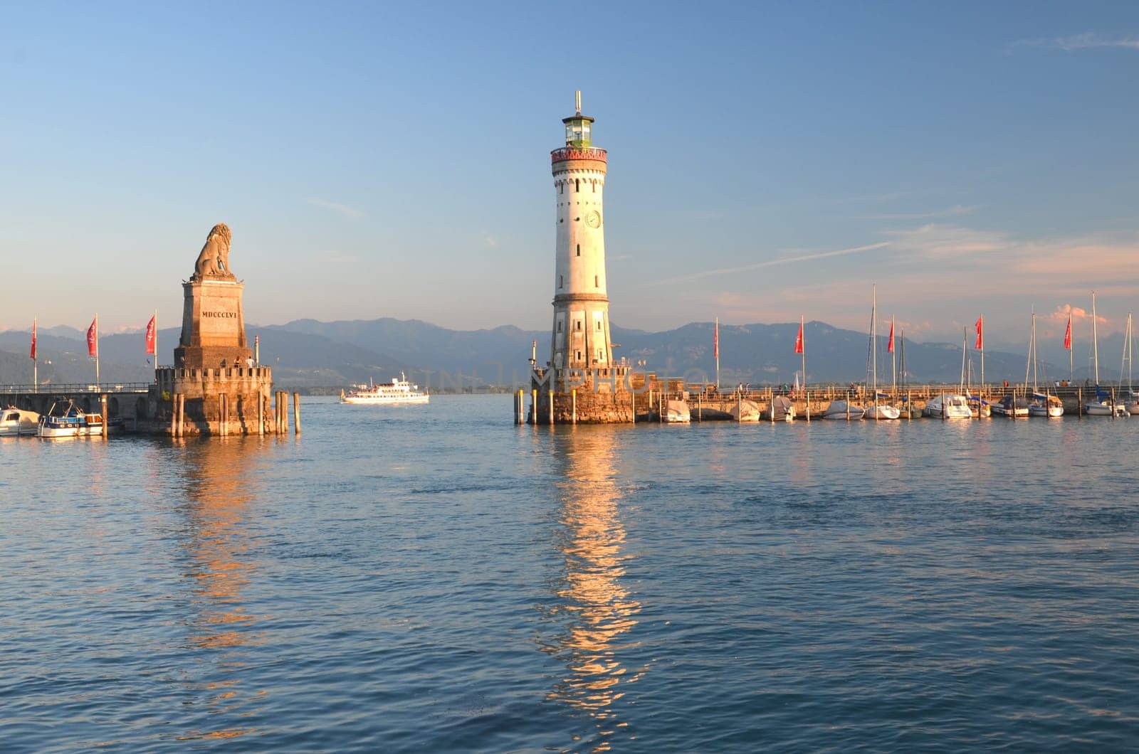 Picturesque view on the entrance of the harbor in Lindau island on Lake Bodensee, Germany