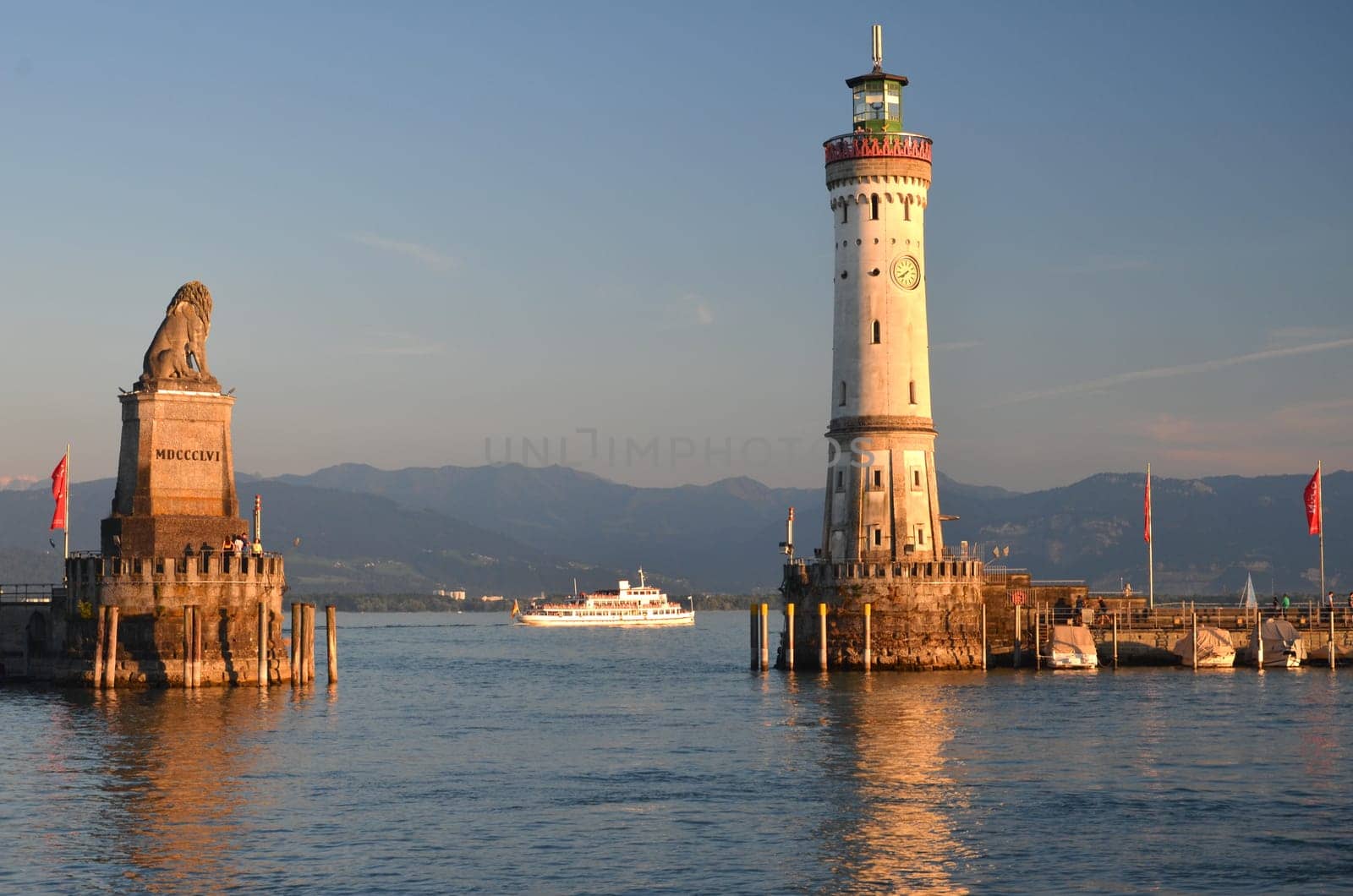 Picturesque view on the entrance of the harbor in Lindau island on Lake Bodensee, Germany