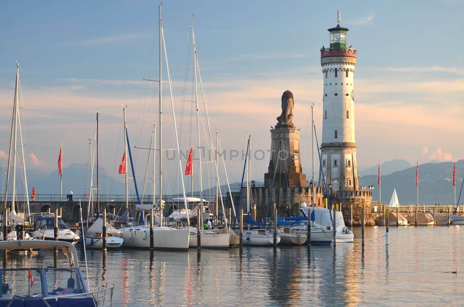 Picturesque view on the entrance of the harbor in Lindau island on Lake Bodensee, Germany