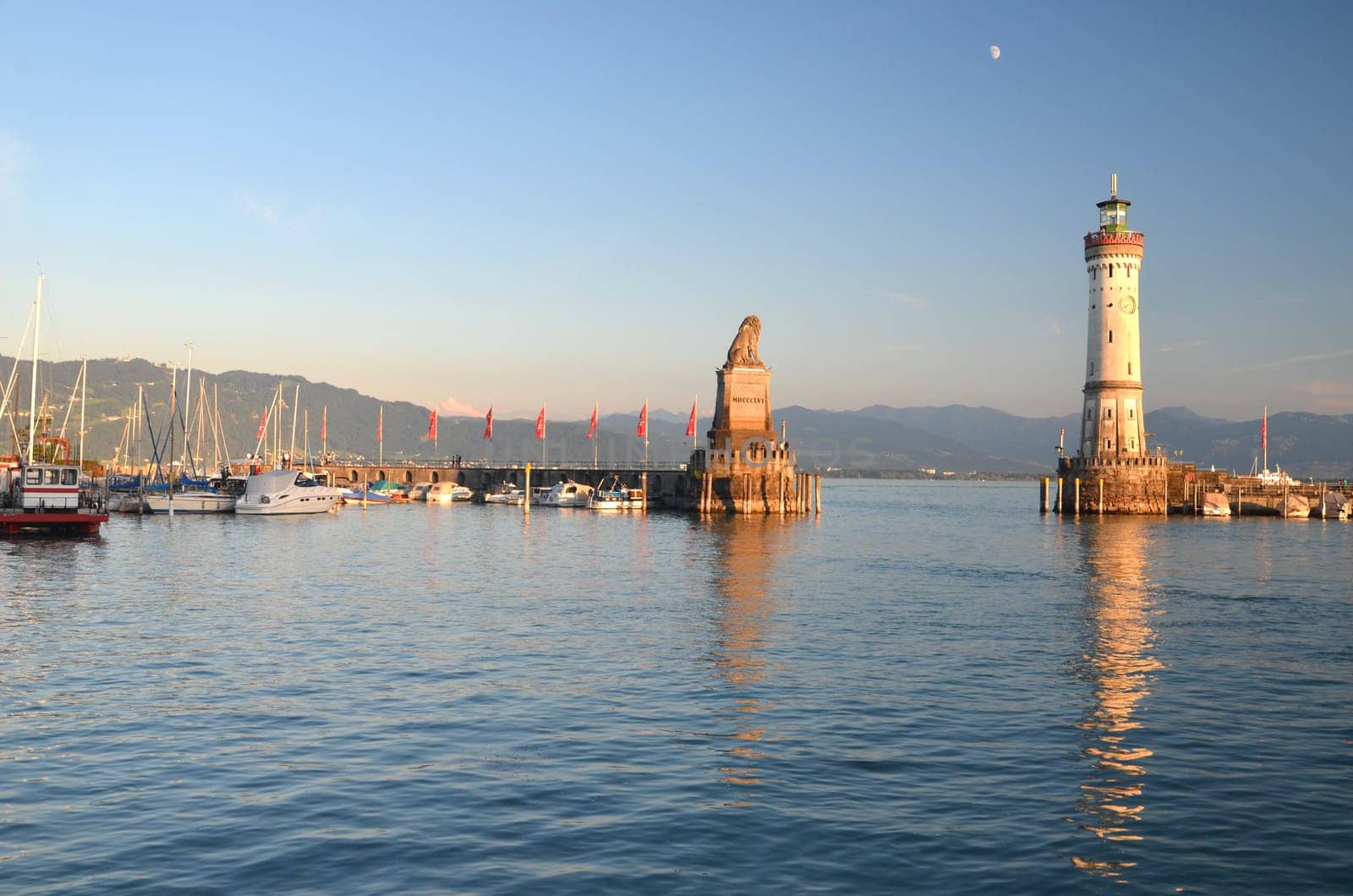 Picturesque view on the entrance of the harbor in Lindau island on Lake Bodensee, Germany