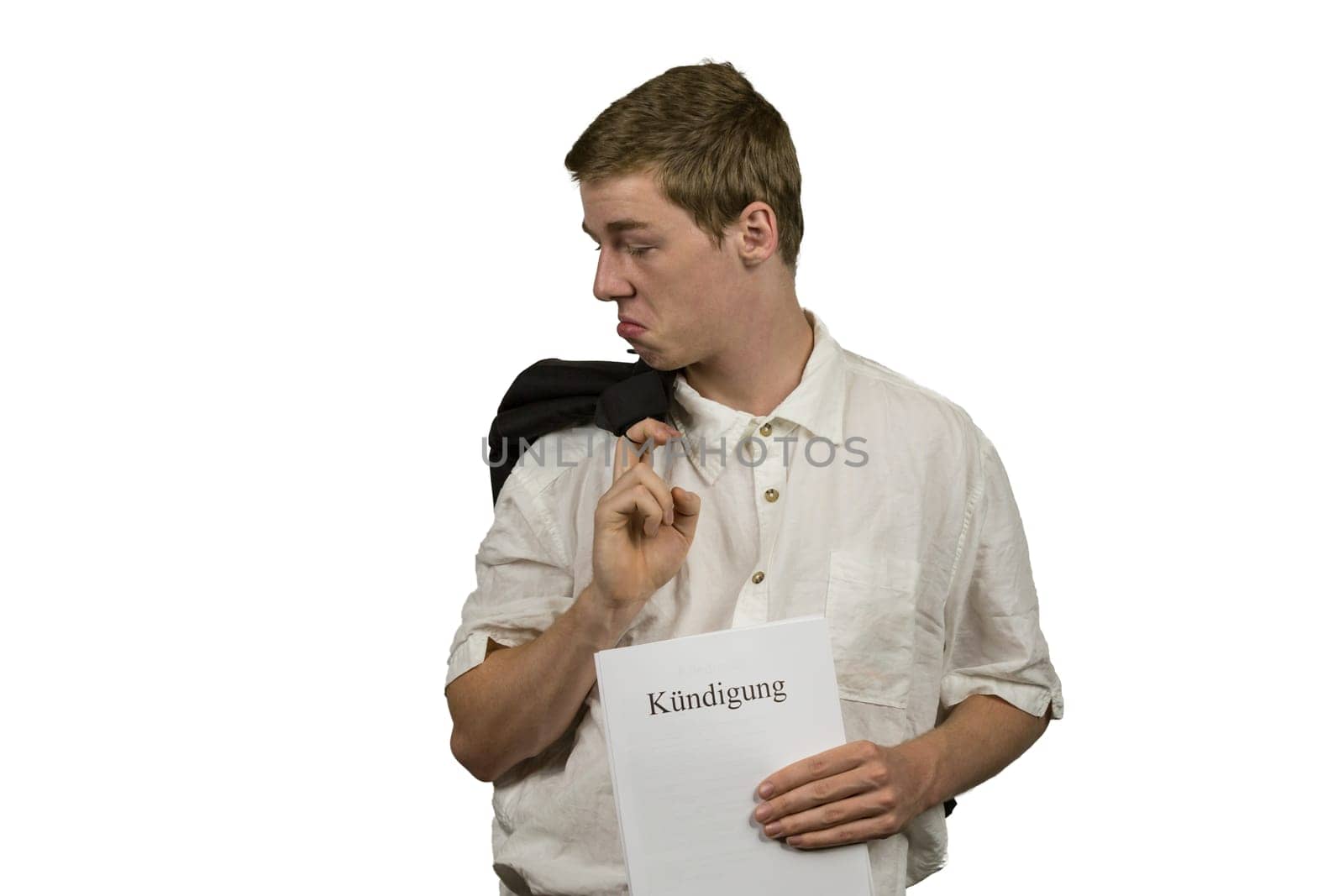 Young man holds the dismissal in his hands and is frustrated