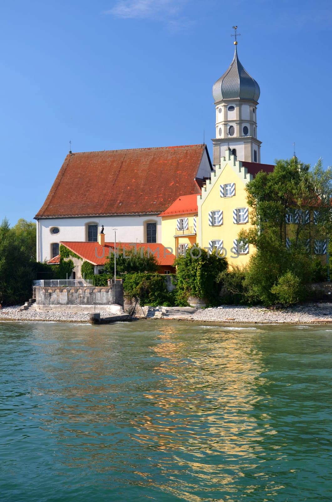 Picturesque view on church in Wasserburg on Lake Bodensee, Germany
