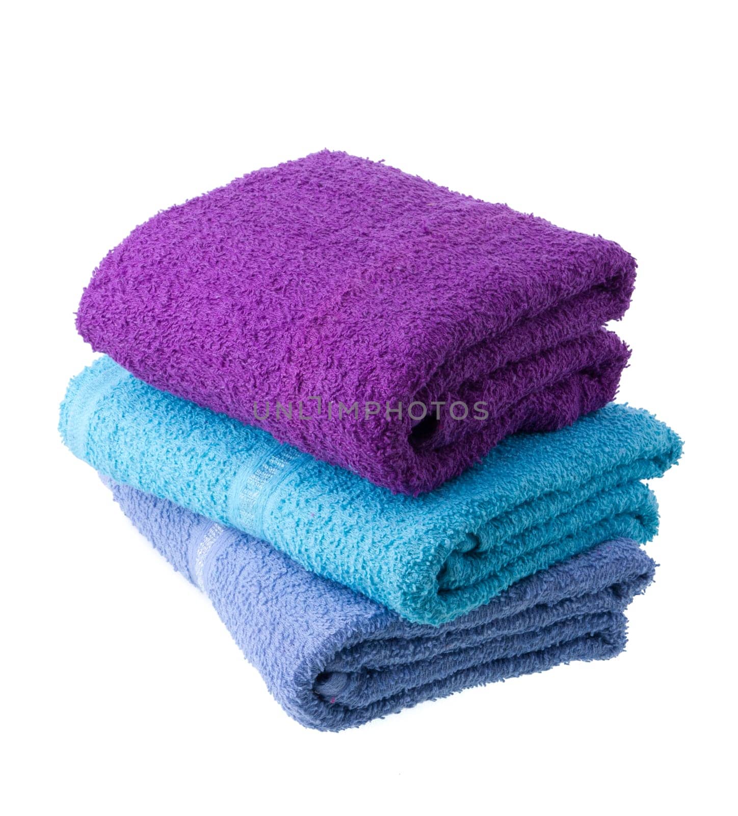 Colorful towels isolated on white background