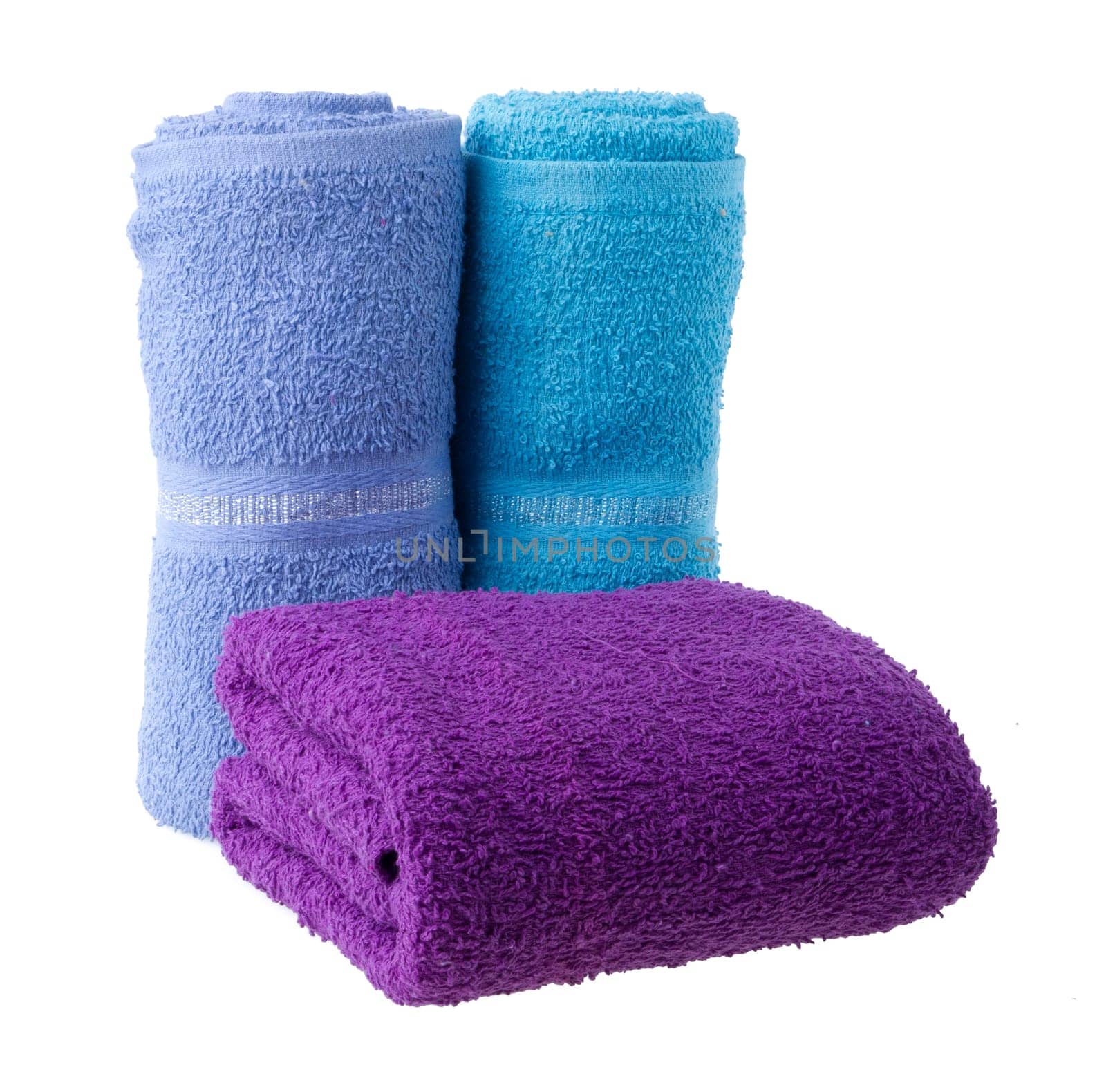 Colorful towels isolated on white background