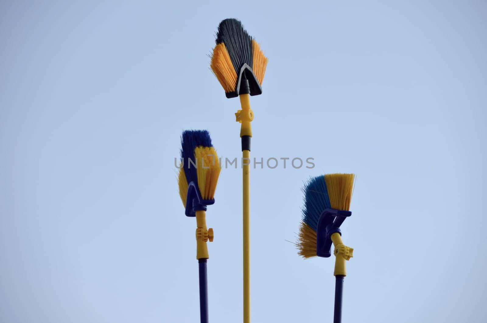 Broom trio