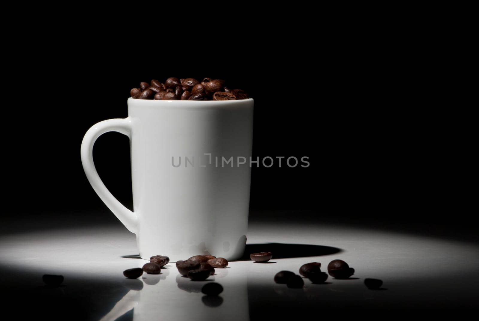 Cup with coffee beans